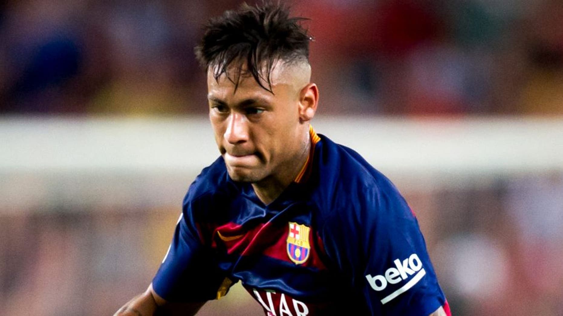 BARCELONA, SPAIN - AUGUST 29: Neymar Santos Jr of FC Barcelona runs with the ball during the La Liga match between FC Barcelona and Malaga CF at Camp Nou on August 29, 2015 in Barcelona, Spain. (Photo by Alex Caparros/Getty Images)