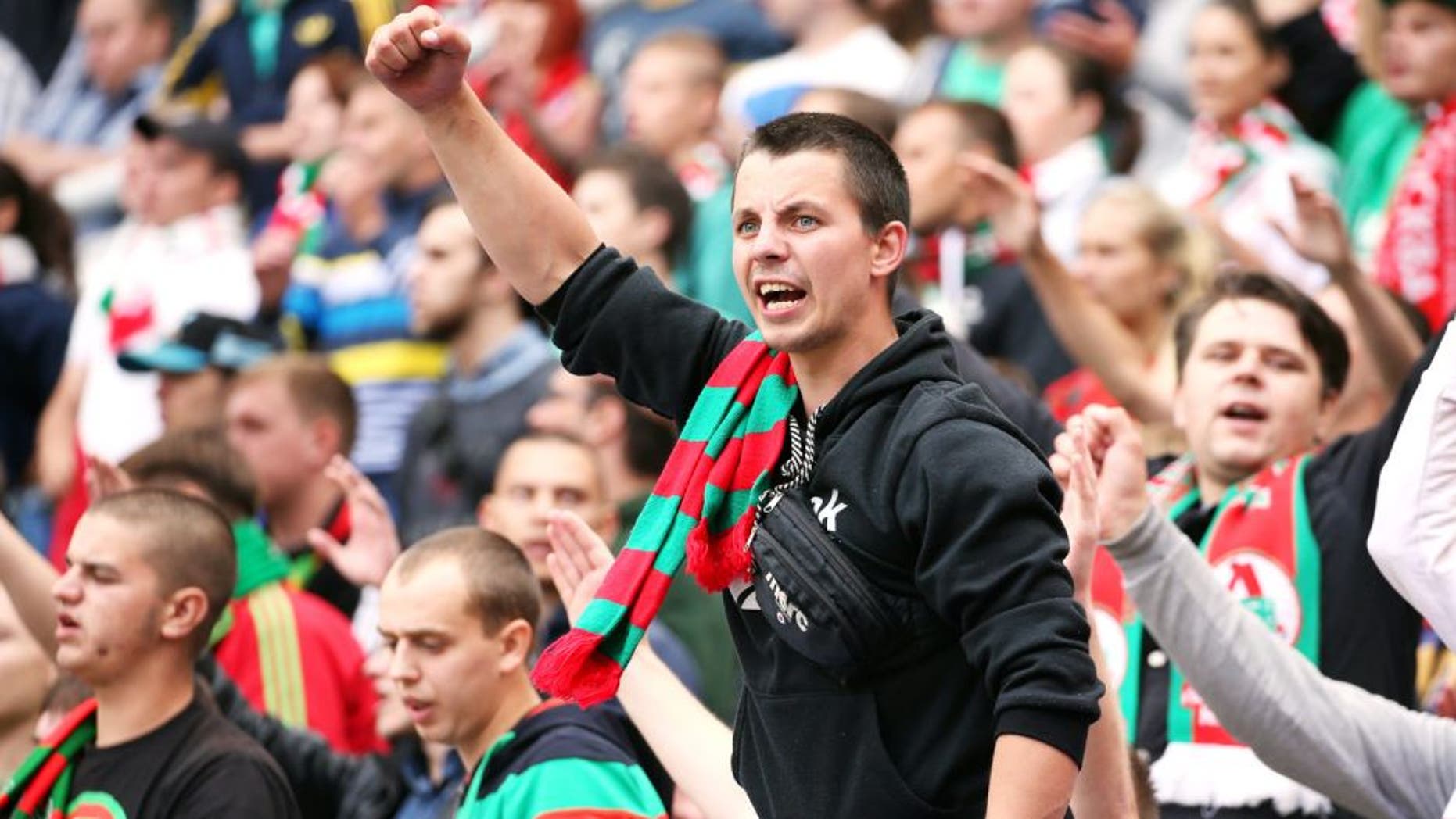 MOSCOW, RUSSIA - AUGUST 16: Fans of FC Lokomotiv Moscow during the Russian Premier League match between FC Lokomotiv Moscow and FC Terek Grozny at the Lokomotiv Stadium on August 16, 2015 in Moscow, Russia. (Photo by Epsilon/Getty Images)