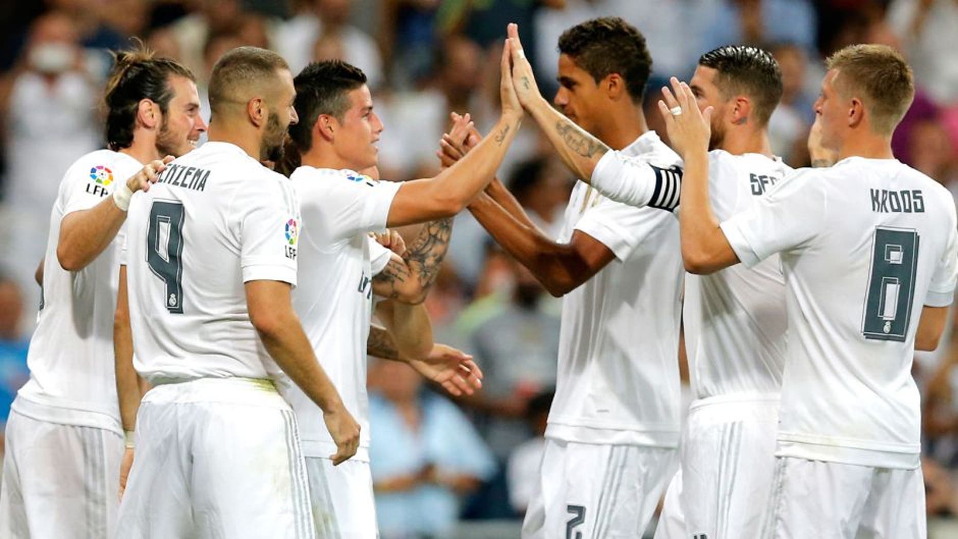 MADRID, SPAIN - AUGUST 29: The players of Real Madrid celebrate after scoring during the La Liga match between Real Madrid CF and Real Betis Balompie at Estadio Santiago Bernabeu on August 29, 2015 in Madrid, Spain. (Photo by Helios de la Rubia/Real Madrid via Getty Images)