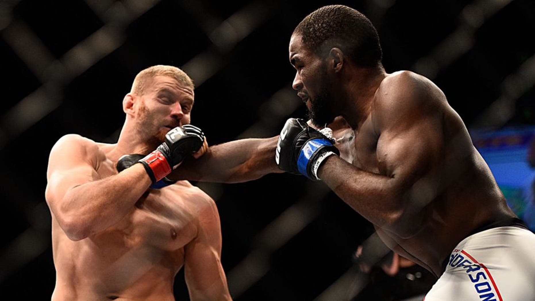 LAS VEGAS, NV - SEPTEMBER 05: (R-L) Corey Anderson punches Jan Blachowicz in their light heavyweight bout during the UFC 191 event inside MGM Grand Garden Arena on September 5, 2015 in Las Vegas, Nevada. (Photo by Jeff Bottari/Zuffa LLC/Zuffa LLC via Getty Images)