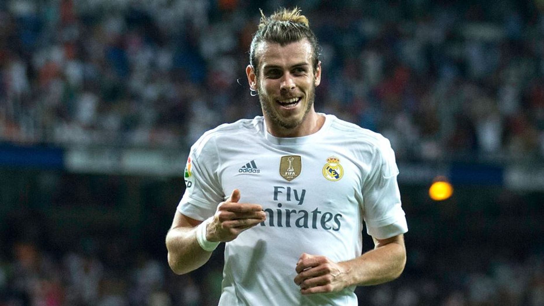 MADRID, SPAIN - AUGUST 29: Gareth Bale of Real Madrid CF celebrates scoring their fifth goal during the La Liga match between Real Madrid CF and Real Betis Balompie at Estadio Santiago Bernabeu on August 29, 2015 in Madrid, Spain. (Photo by Gonzalo Arroyo Moreno/Getty Images)