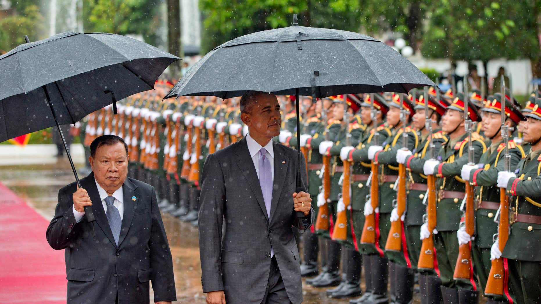 Sept. 6, 2016: Laotian President Bounnhang Vorachit, left and U.S.President Barack Obama inspect a honor guard at the Presidential Palace in Vientiane, Laos.