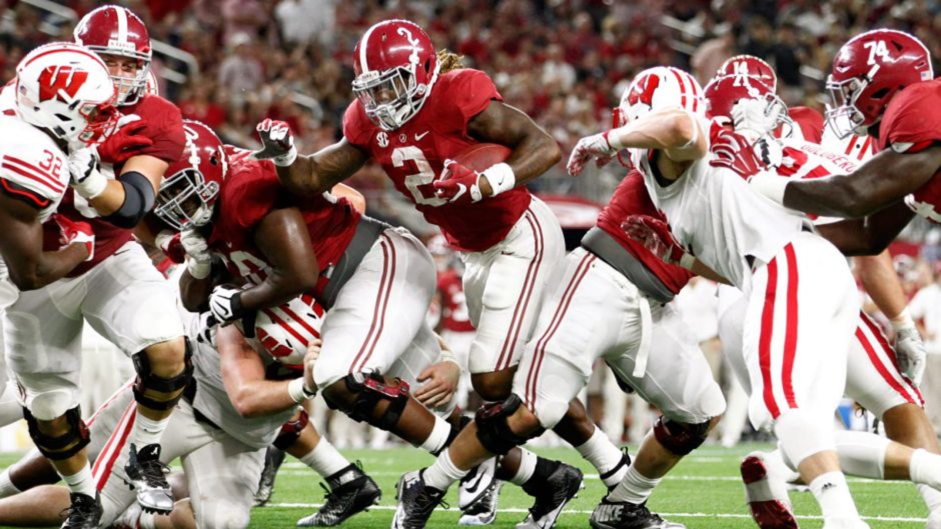 Sep 5, 2015; Arlington, TX, USA; Alabama Crimson Tide running back Derrick Henry (2) scores a touchdown against the Wisconsin Badgers during the third quarter at AT&T Stadium. Mandatory Credit: Tim Heitman-USA TODAY Sports