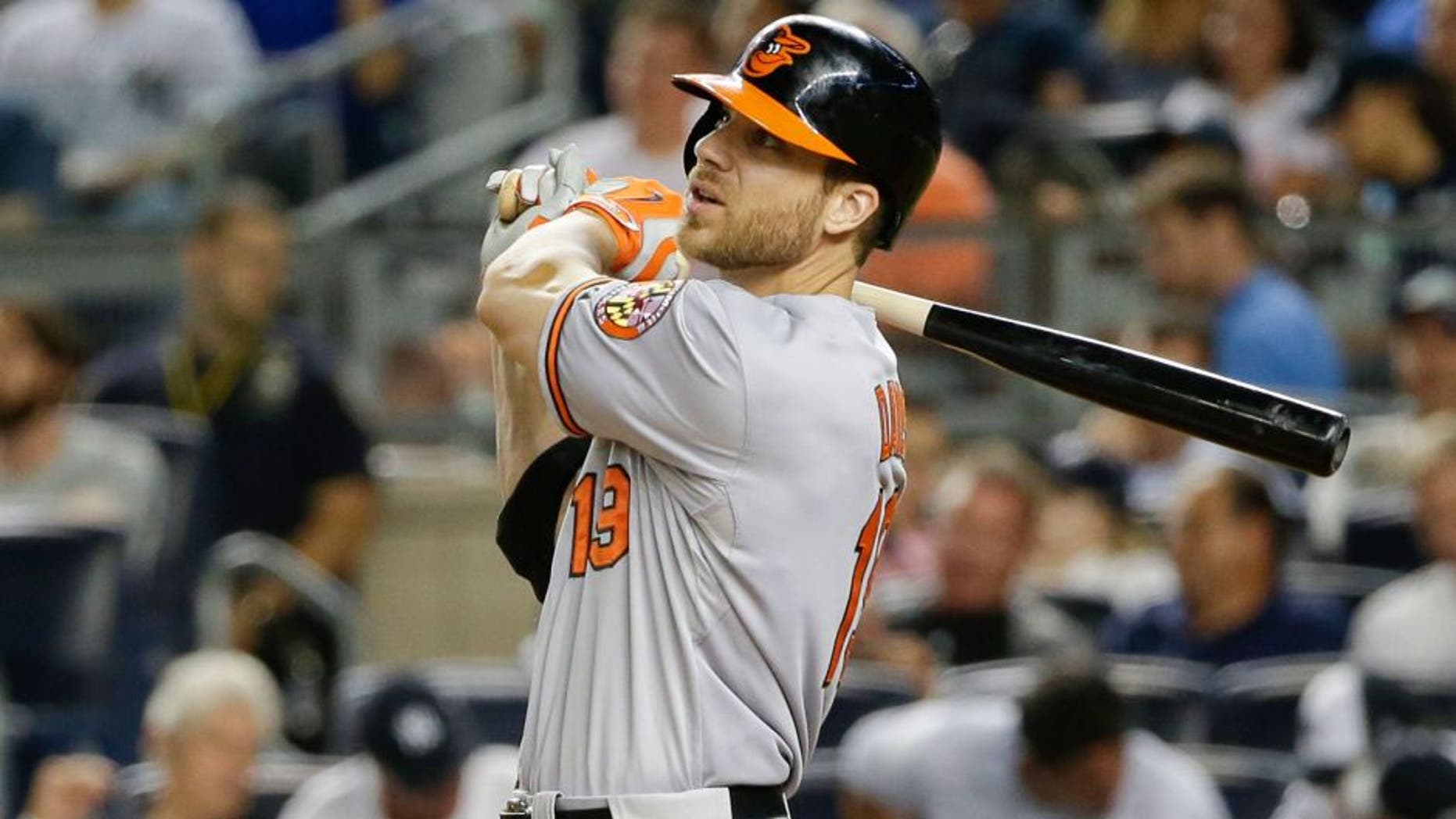 Baltimore Orioles' Chris Davis hits a home run during the ninth inning of a baseball game against the New York Yankees on Tuesday, Sept. 8, 2015, in New York. The Orioles won 2-1. (AP Photo/Frank Franklin II)