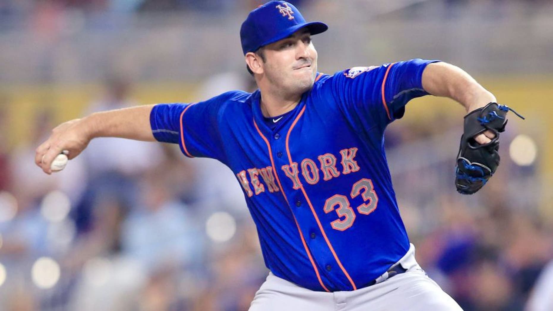 Aug 5, 2015; Miami, FL, USA; New York Mets starting pitcher Matt Harvey (33) throws the ball in the first inning of a game against the Miami Marlins at Marlins Park. Mandatory Credit: Robert Mayer-USA TODAY Sports