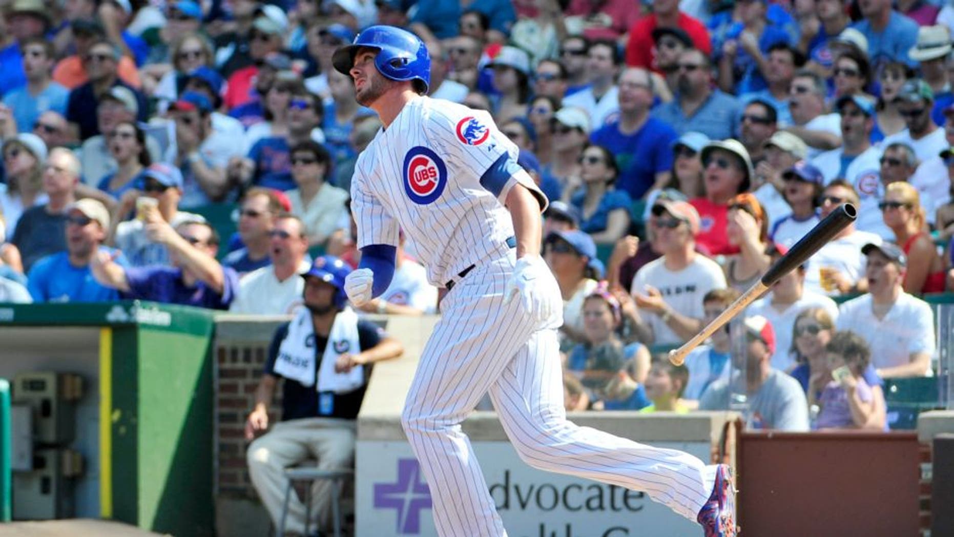 CHICAGO, IL - SEPTEMBER 06: Kris Bryant #17 of the Chicago Cubs hits a home run against the Arizona Diamondbacks during the fifth inning on September 6, 2015 at Wrigley Field in Chicago, Illinois. (Photo by David Banks/Getty Images)