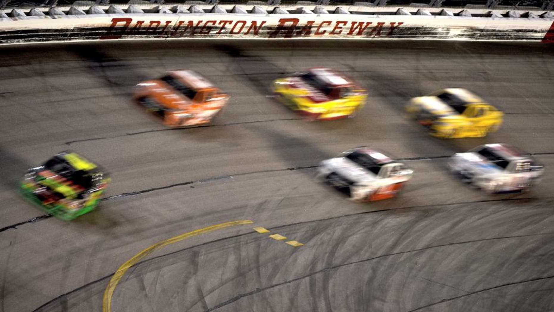 DARLINGTON, SC - SEPTEMBER 06: Kyle Larson, driver of the #42 Mello Yello Chevrolet, leads a pack of cars during the NASCAR Sprint Cup Series Bojangles' Southern 500 at Darlington Raceway on September 6, 2015 in Darlington, South Carolina. (Photo by Jonathan Moore/Getty Images)