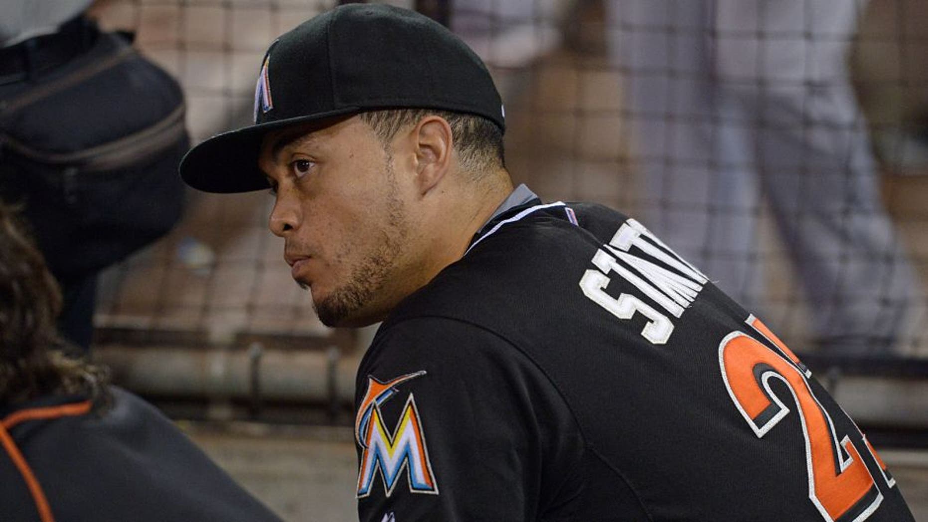 Jul 25, 2015; San Diego, CA, USA; Miami Marlins right fielder Giancarlo Stanton (27) watches game action during the ninth inning against the San Diego Padres at Petco Park. Mandatory Credit: Jake Roth-USA TODAY Sports
