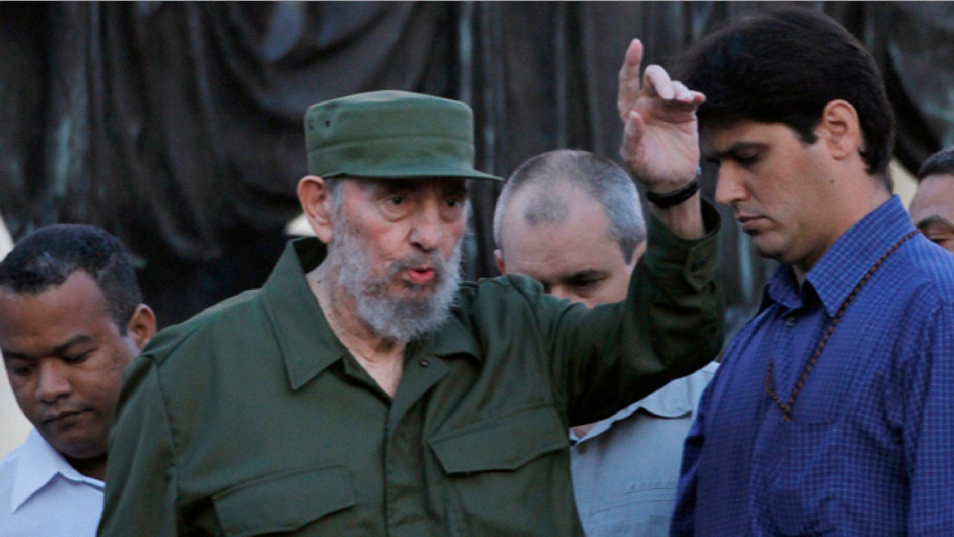Sept. 3: Cuba's leader Fidel Castro greets students before delivering a speech outside Havana's University in Havana, Cuba.