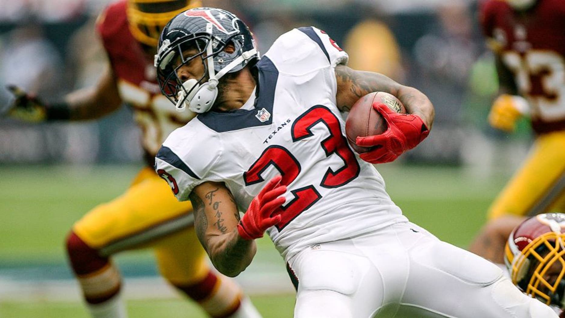 Sep 7, 2014; Houston, TX, USA; Houston Texans running back Arian Foster (23) runs with the ball during the first quarter against the Washington Redskins at NRG Stadium. Mandatory Credit: Troy Taormina-USA TODAY Sports