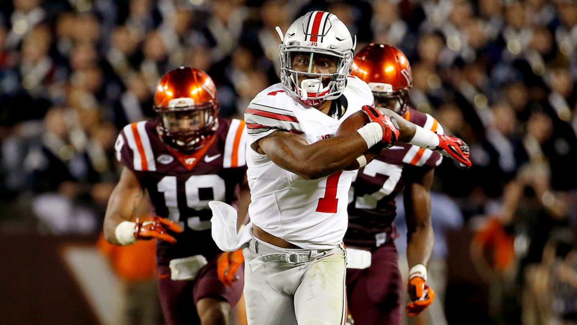 Sep 7, 2015; Blacksburg, VA, USA; Ohio State Buckeyes wide receiver Braxton Miller (1) runs for a touchdown during the third quarter against the Virginia Tech Hokies at Lane Stadium. Mandatory Credit: Peter Casey-USA TODAY Sports