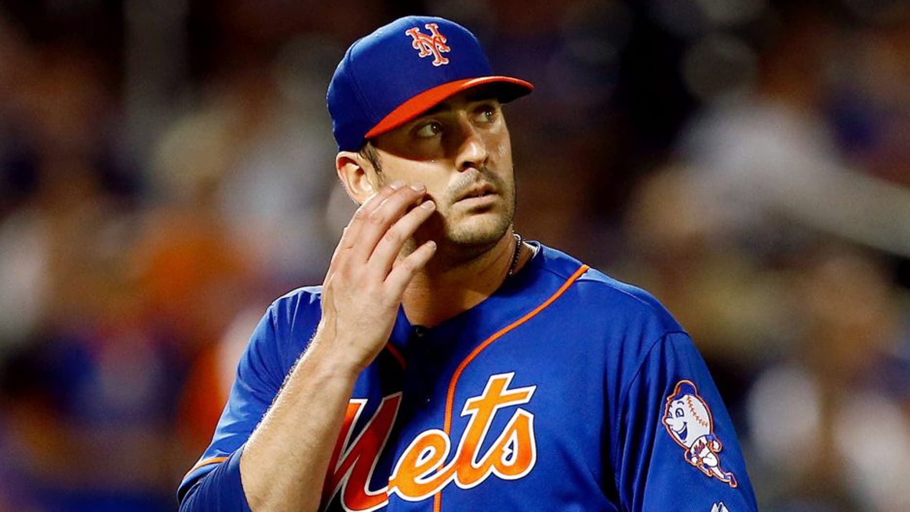 NEW YORK, NY - MAY 29: Matt Harvey #33 of the New York Mets walks off the mound against the Miami Marlins during a game on May 29, 2015 at Citi Field in the Flushing neighborhood of the Queens borough of New York City. (Photo by Rich Schultz/Getty Images)