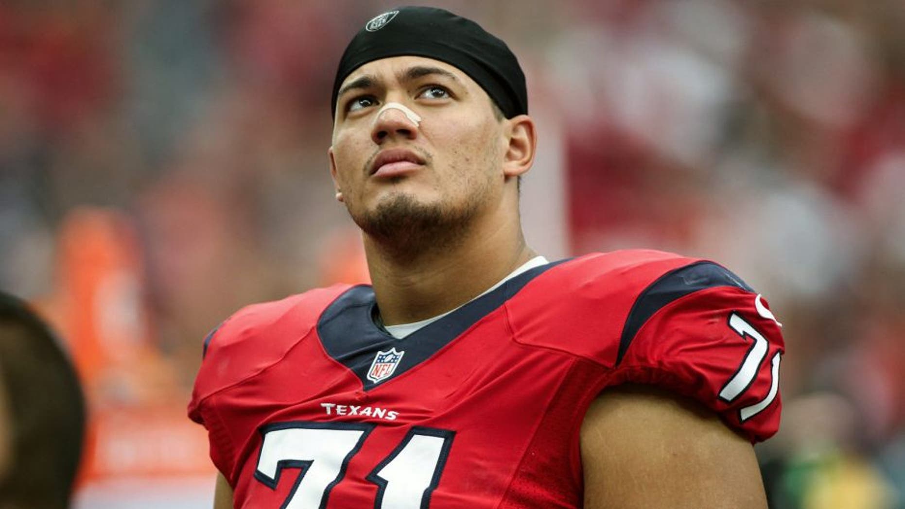 Nov 2, 2014; Houston, TX, USA; Houston Texans guard Xavier Su'a-Filo (71) during the game against the Philadelphia Eagles at NRG Stadium. Mandatory Credit: Troy Taormina-USA TODAY Sports