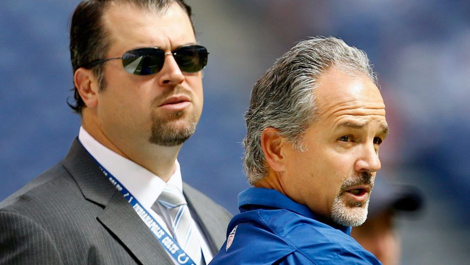 Indianapolis Colts head coach Chuck Pagano talks with Colts GM Ryan Grigson before the game. The Colts and the Dolphins warm up before first-half action at Lucas Oil Stadium in Indianapolis, Indiana, Sunday, September 15, 2013. (Sam Riche/MCT via Getty Images)