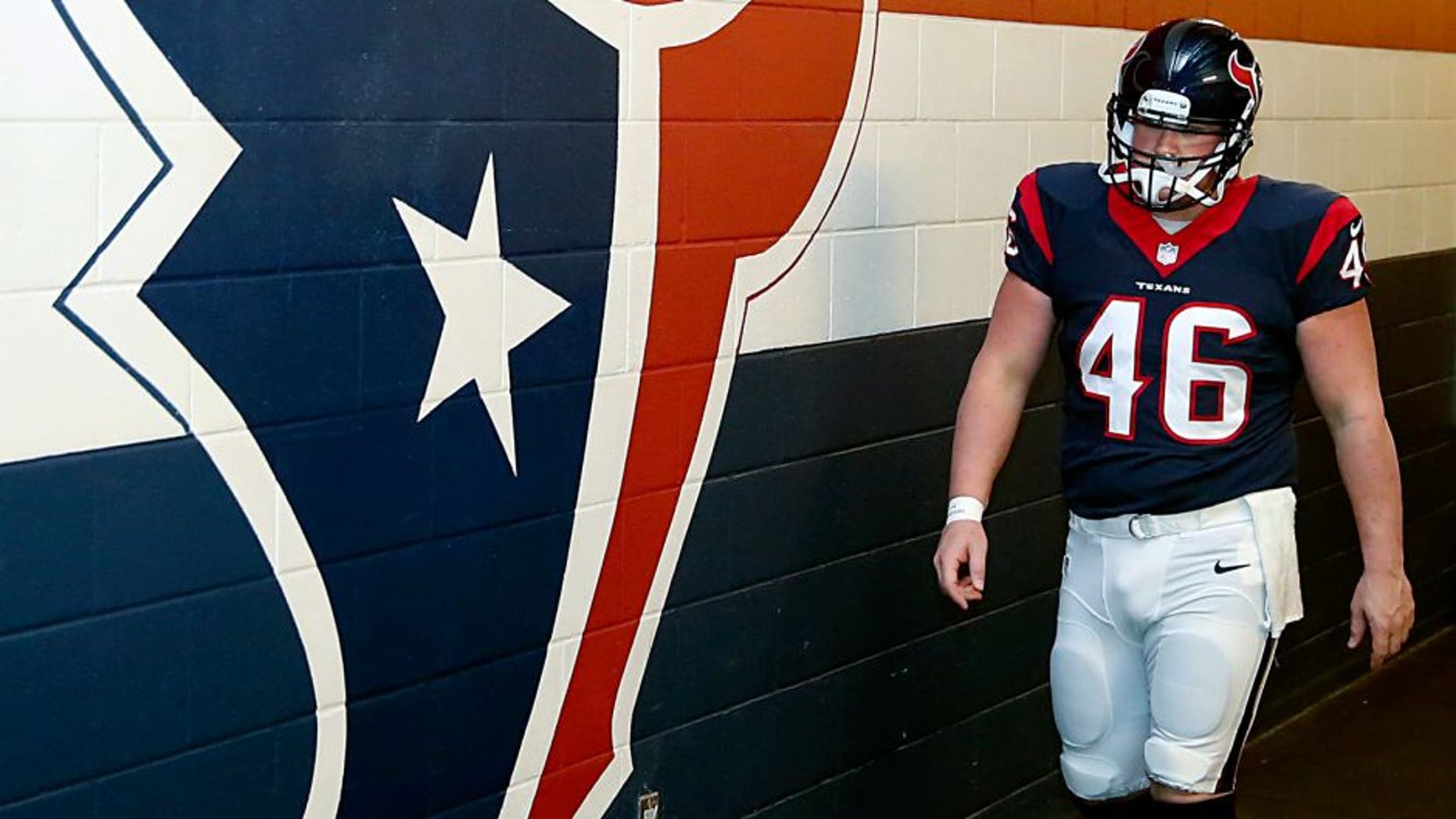 HOUSTON, TX - DECEMBER 28: Jon Weeks #46 of the Houston Texans walks to the field before the Texans play the Jacksonville Jaguars in a NFL game on December 28, 2014 at NRG Stadium in Houston, Texas. (Photo by Thomas B. Shea/Getty Images)
