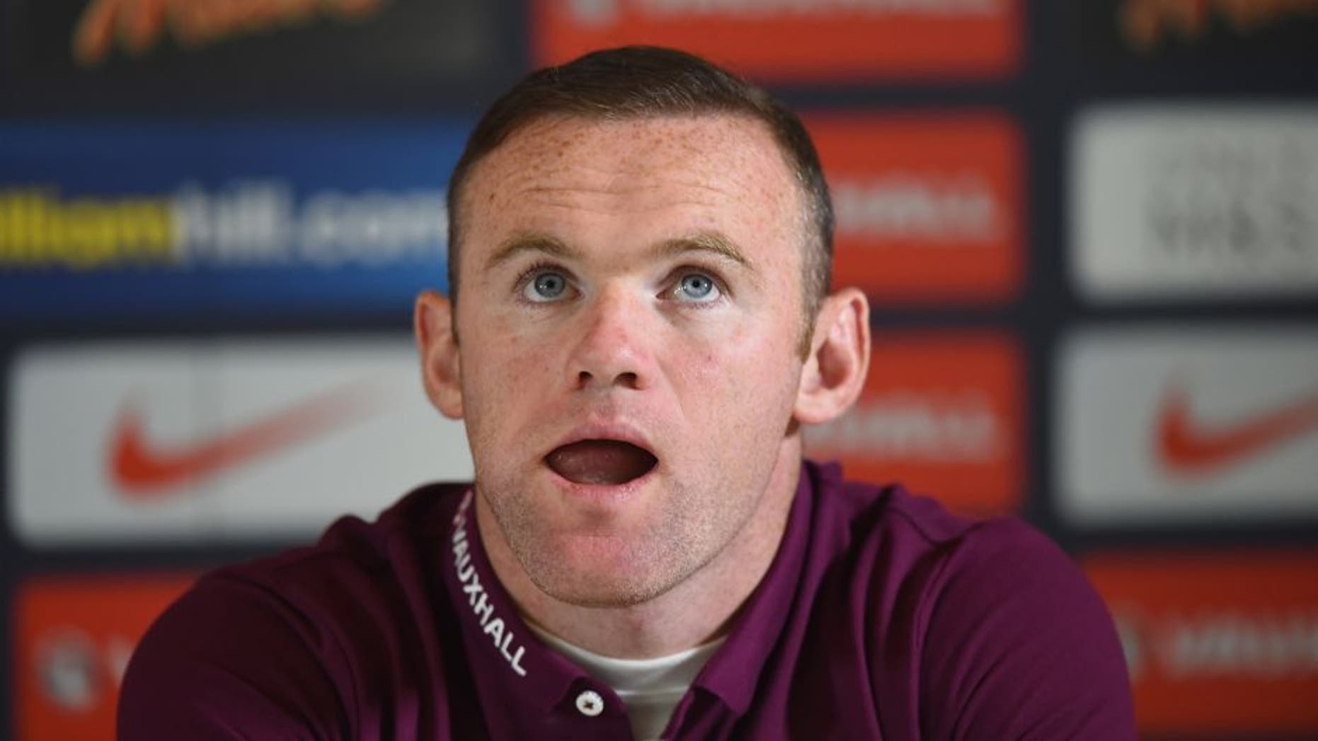WATFORD, ENGLAND - SEPTEMBER 07: Wayne Rooney of England talks to the media during a Press Conference at the Grove Hotel on September 7, 2015 in Watford, England. (Photo by Shaun Botterill/Getty Images)