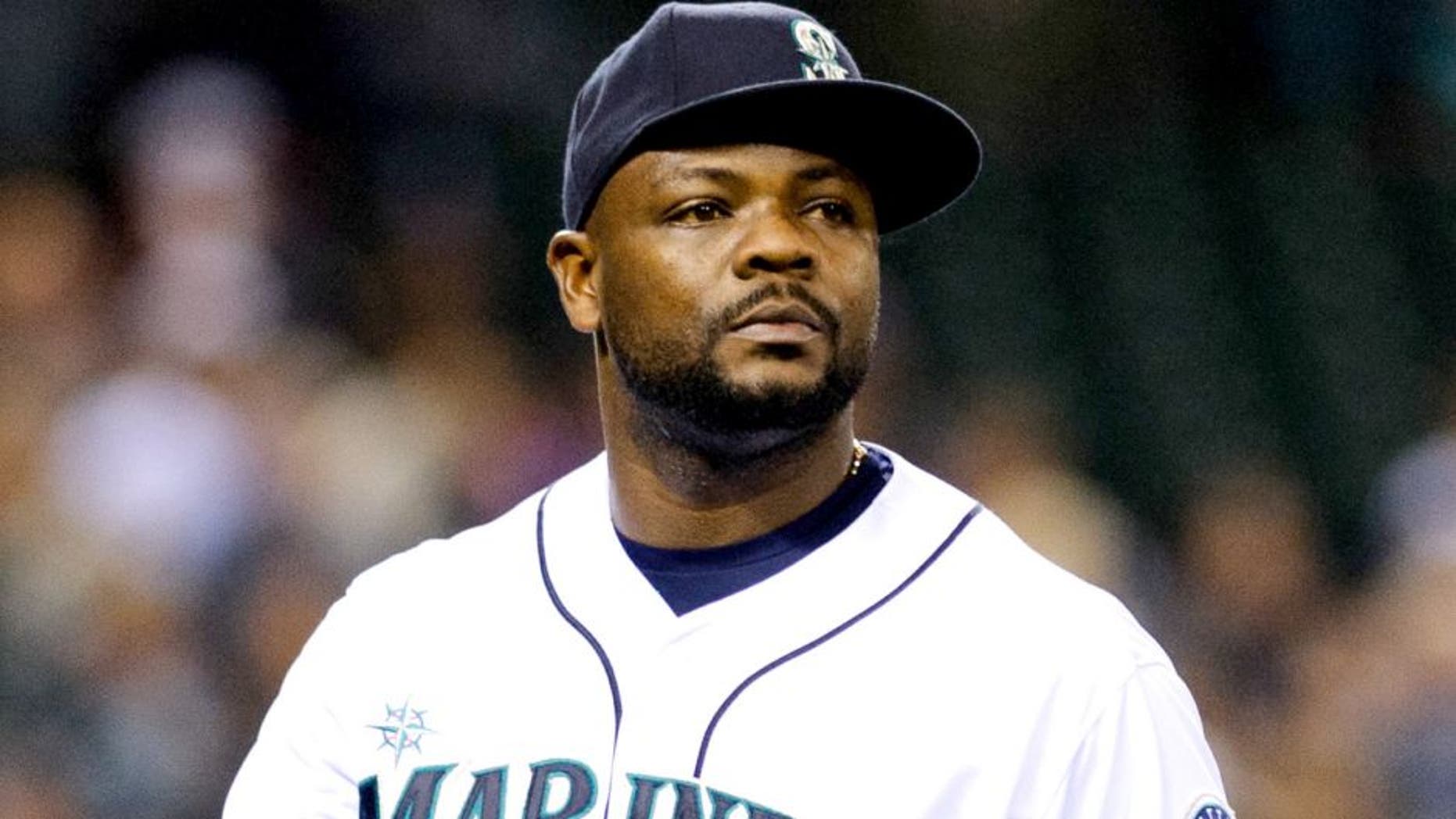 Jun 14, 2014; Seattle, WA, USA; Seattle Mariners relief pitcher Fernando Rodney (56) during the game against the Texas Rangers at Safeco Field. Texas defeated Seattle 4-3. Mandatory Credit: Steven Bisig-USA TODAY Sports
