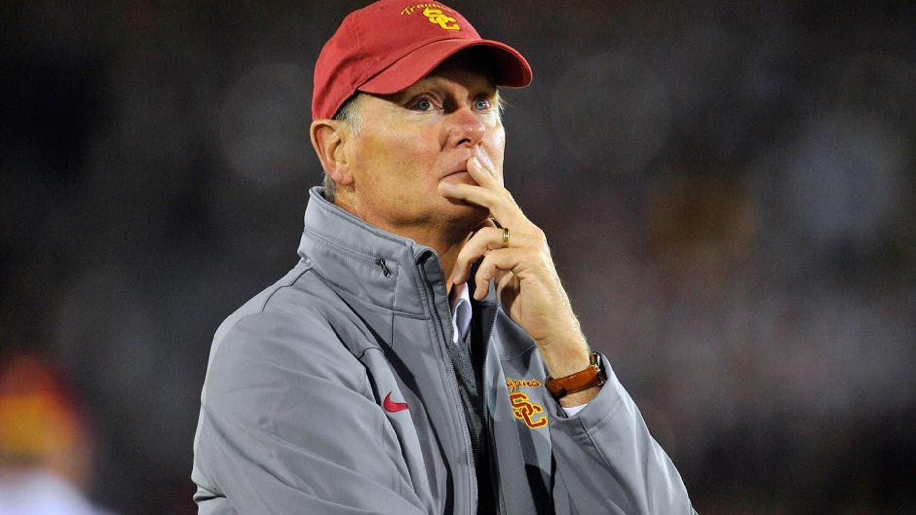 October 10, 2013; Los Angeles, CA, USA; Southern California Trojans athletic director Pat Haden watches game action against the Arizona Wildcats during the second half at the Los Angeles Memorial Coliseum. Mandatory Credit: Gary A. Vasquez-USA TODAY Sports