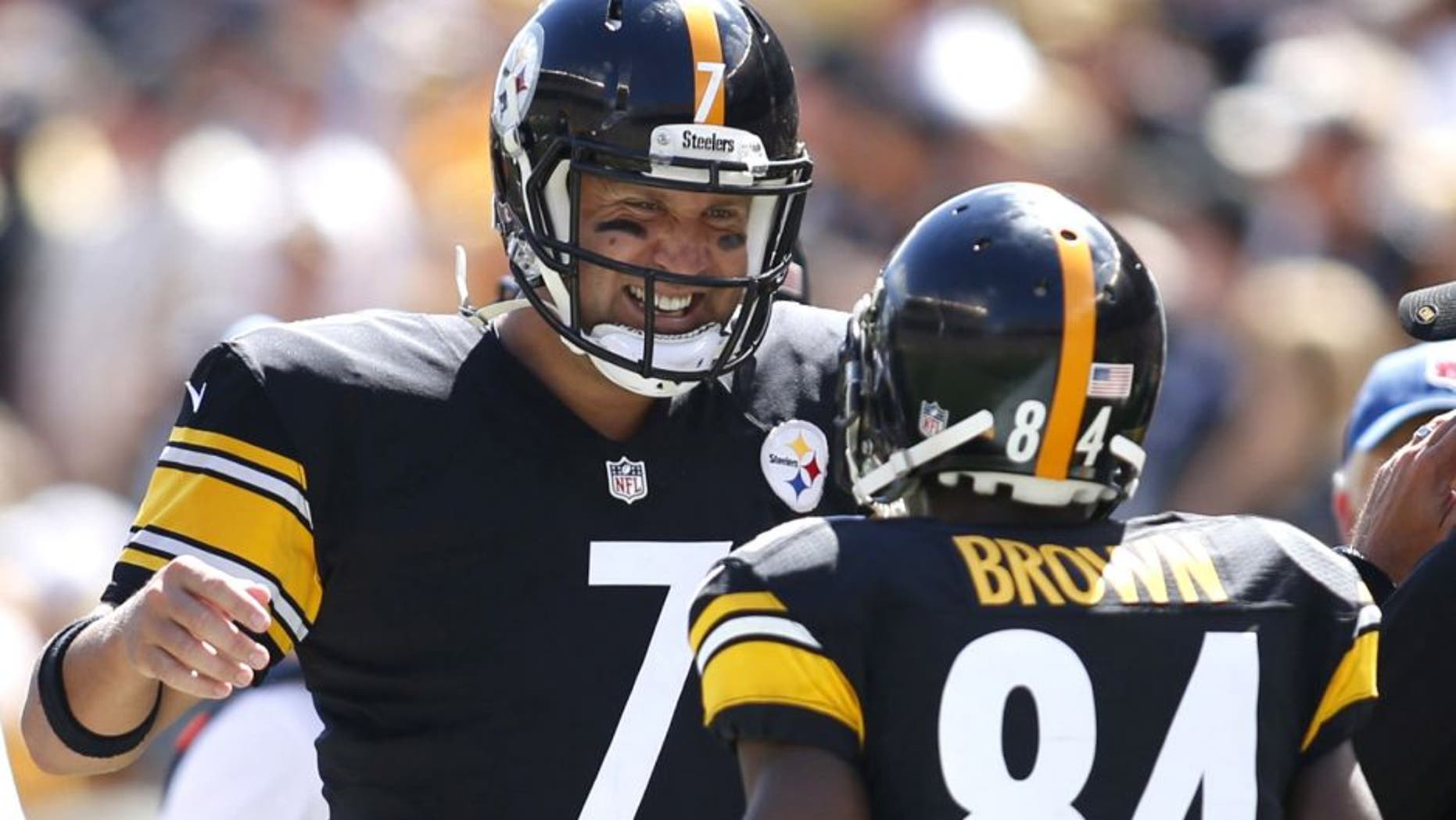 Sep 7, 2014; Pittsburgh, PA, USA; Pittsburgh Steelers quarterback Ben Roethlisberger (7) and wide receiver Antonio Brown (84) celebrate a touchdown against the Cleveland Browns during the second quarter at Heinz Field. Mandatory Credit: Charles LeClaire-USA TODAY Sports