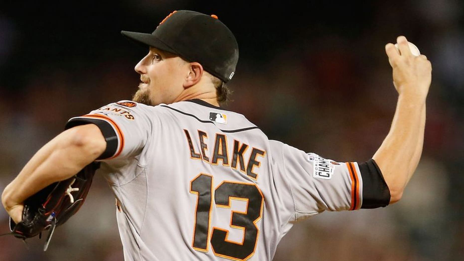 PHOENIX, AZ - SEPTEMBER 07: Starting pitcher Mike Leake #13 of the San Francisco Giants pitches against the Arizona Diamondbacks during the first inning of the MLB game at Chase Field on September 7, 2015 in Phoenix, Arizona. (Photo by Christian Petersen/Getty Images)