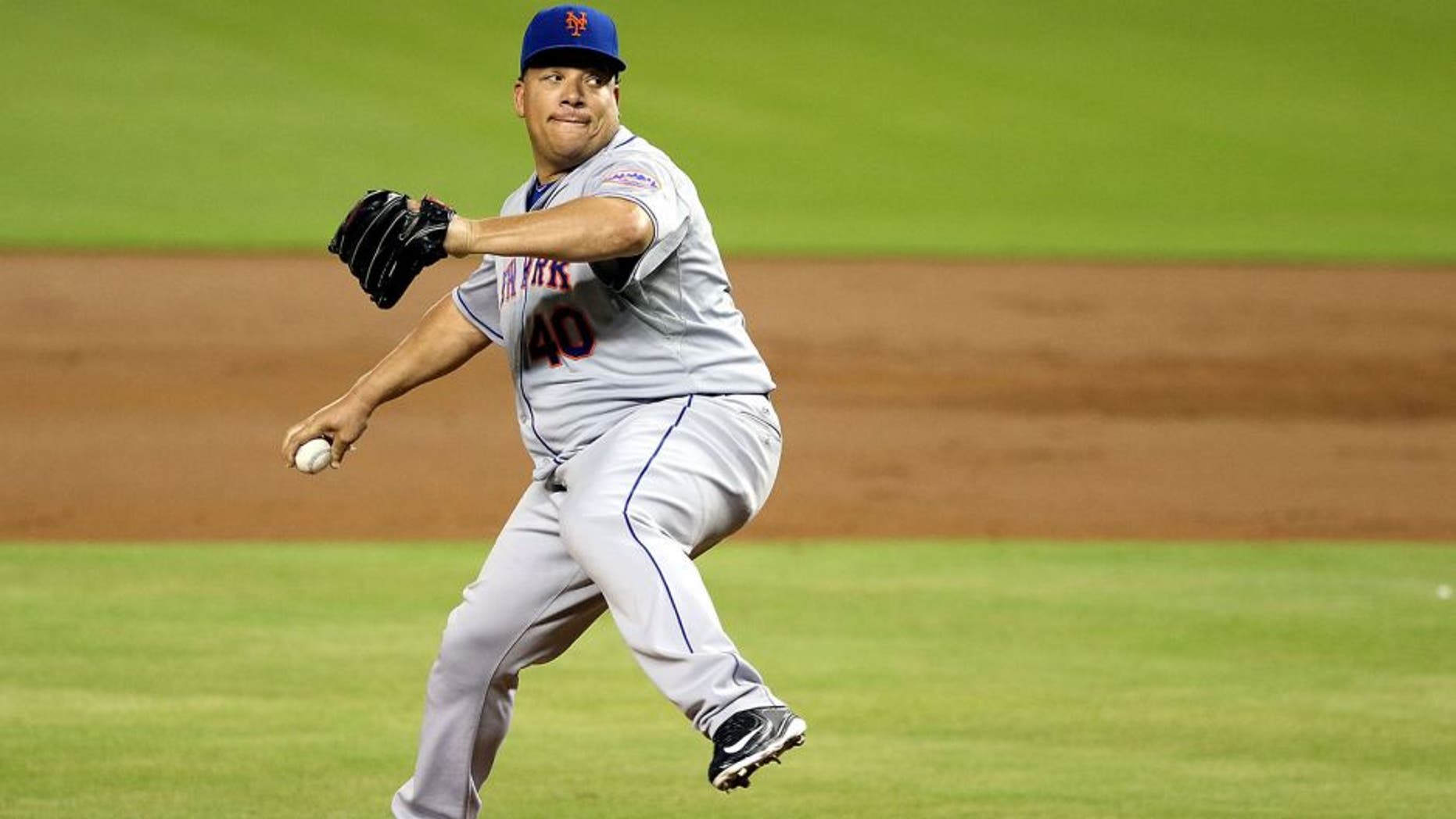 MIAMI, FL - SEPTEMBER 05: Pitcher Bartolo Colon #40 of the New York Mets throws during the first inning against the Miami Marlins at Marlins Park on September 5, 2015 in Miami, Florida. (Photo by Marc Serota/Getty Images)