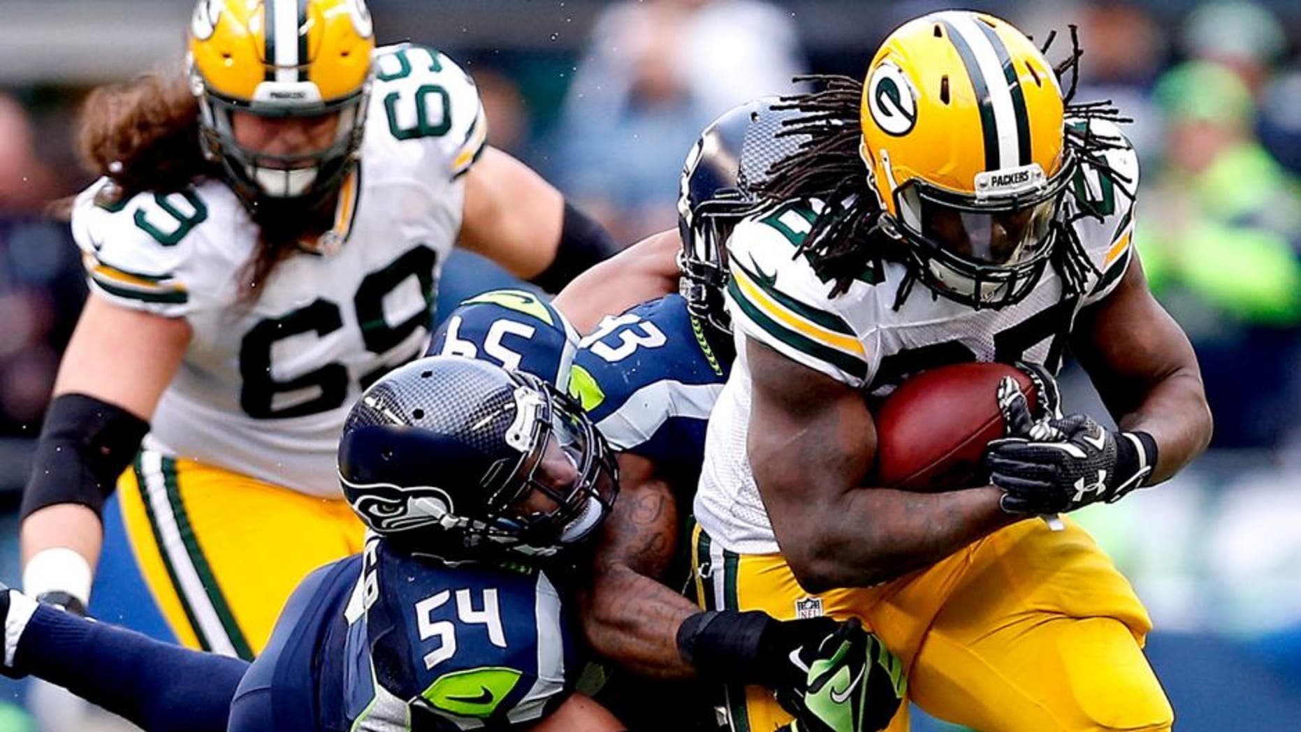 SEATTLE, WA - JANUARY 18: Eddie Lacy #27 of the Green Bay Packers runs the ball in the second half against the Seattle Seahawks during the 2015 NFC Championship game at CenturyLink Field on January 18, 2015 in Seattle, Washington. (Photo by Christian Petersen/Getty Images)