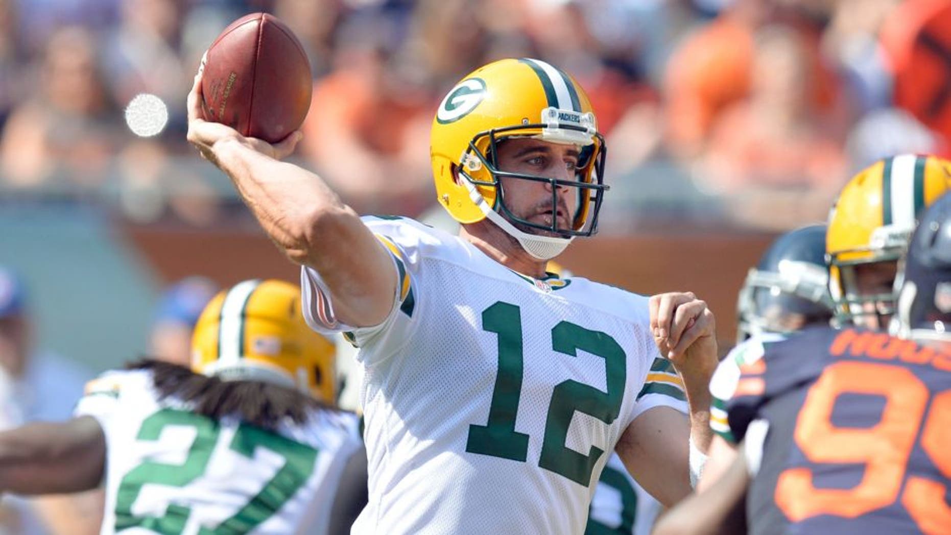 Quarterback Aaron Rodgers #12 of the Green Bay Packers passes during the second quarter against the Chicago Bears on September 28, 2014 at Soldier Field in Chicago, Illinois. The Packers defeated the Bears 38-17. (Photo by Brian D. Kersey/Getty Images)
