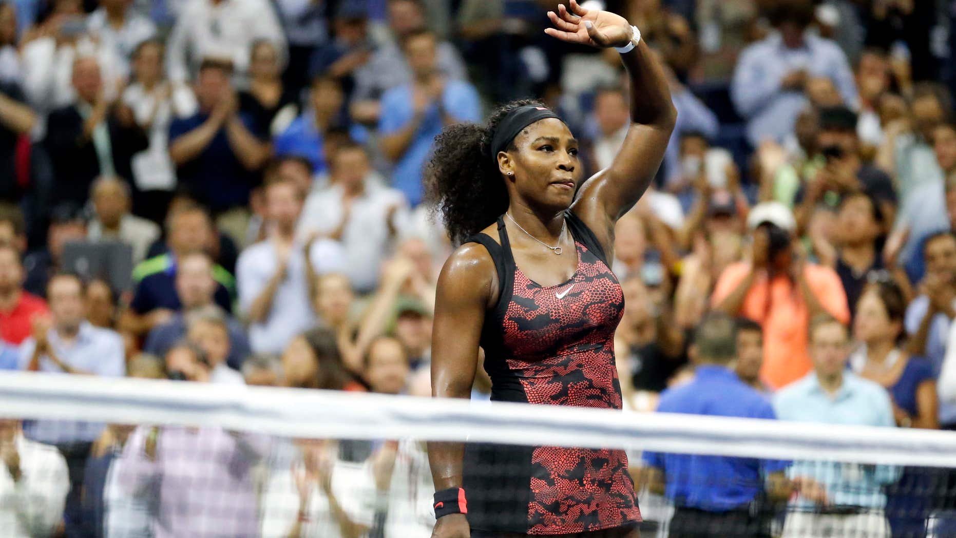 Sept. 8, 2015: Serena Williams waves to the crowd after beating Venus Williams during a quarterfinal match at the U.S. Open tennis tournament in New York.
