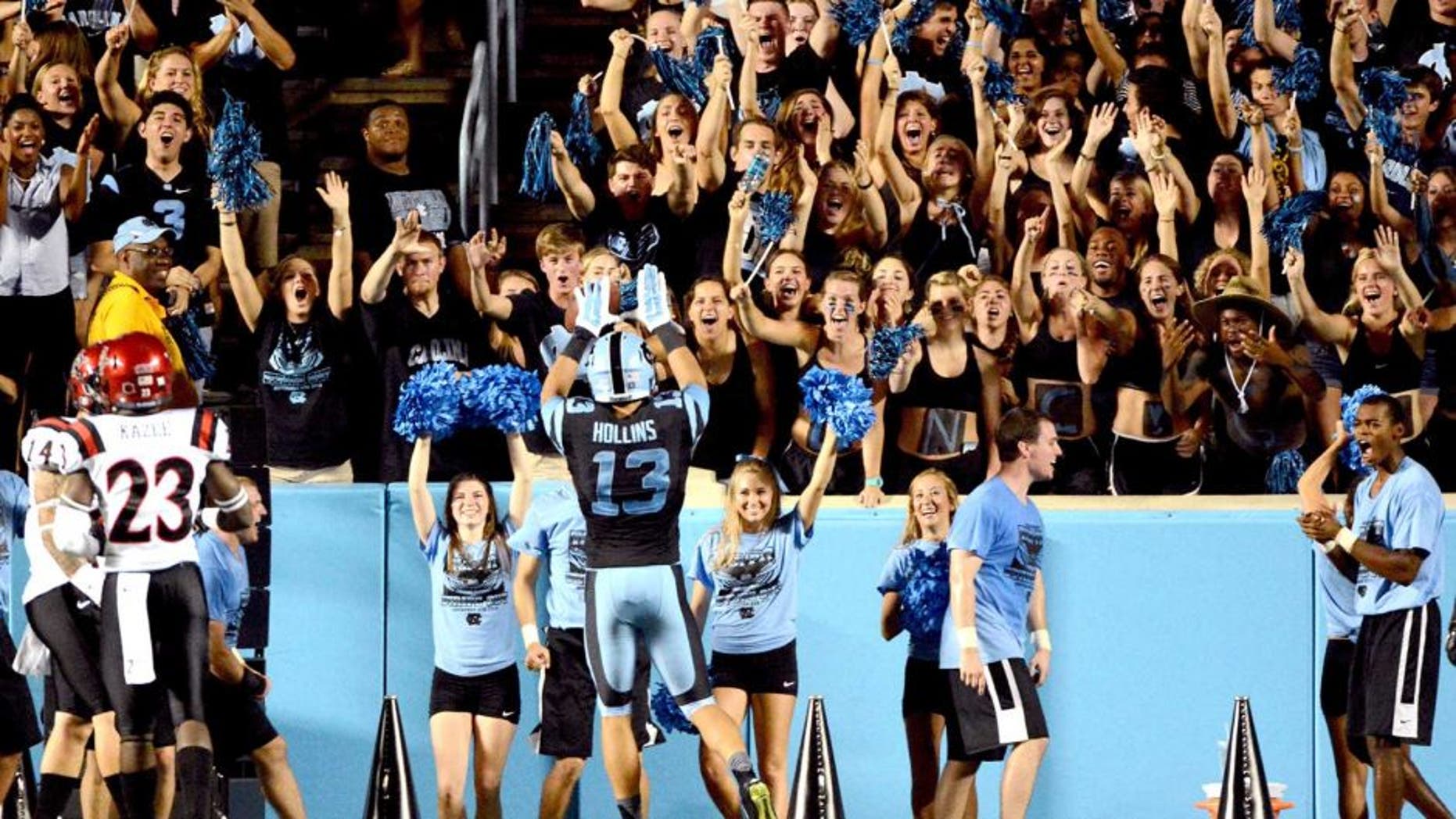 Sep 6, 2014; Chapel Hill, NC, USA;North Carolina Tar Heels receiver Mack Hollins (13) celebrates a touchdown with fans during the second half against the San Diego State Aztecs at Kenan Memorial Stadium. North Carolina won 31-27. Mandatory Credit: Rob Kinnan-USA TODAY Sports