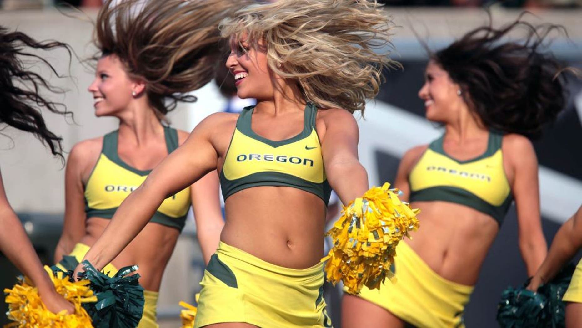 Sep 6, 2014; Eugene, OR, USA; Oregon Ducks cheerleaders preform against the Michigan State Spartans at Autzen Stadium. Mandatory Credit: Scott Olmos-USA TODAY Sports