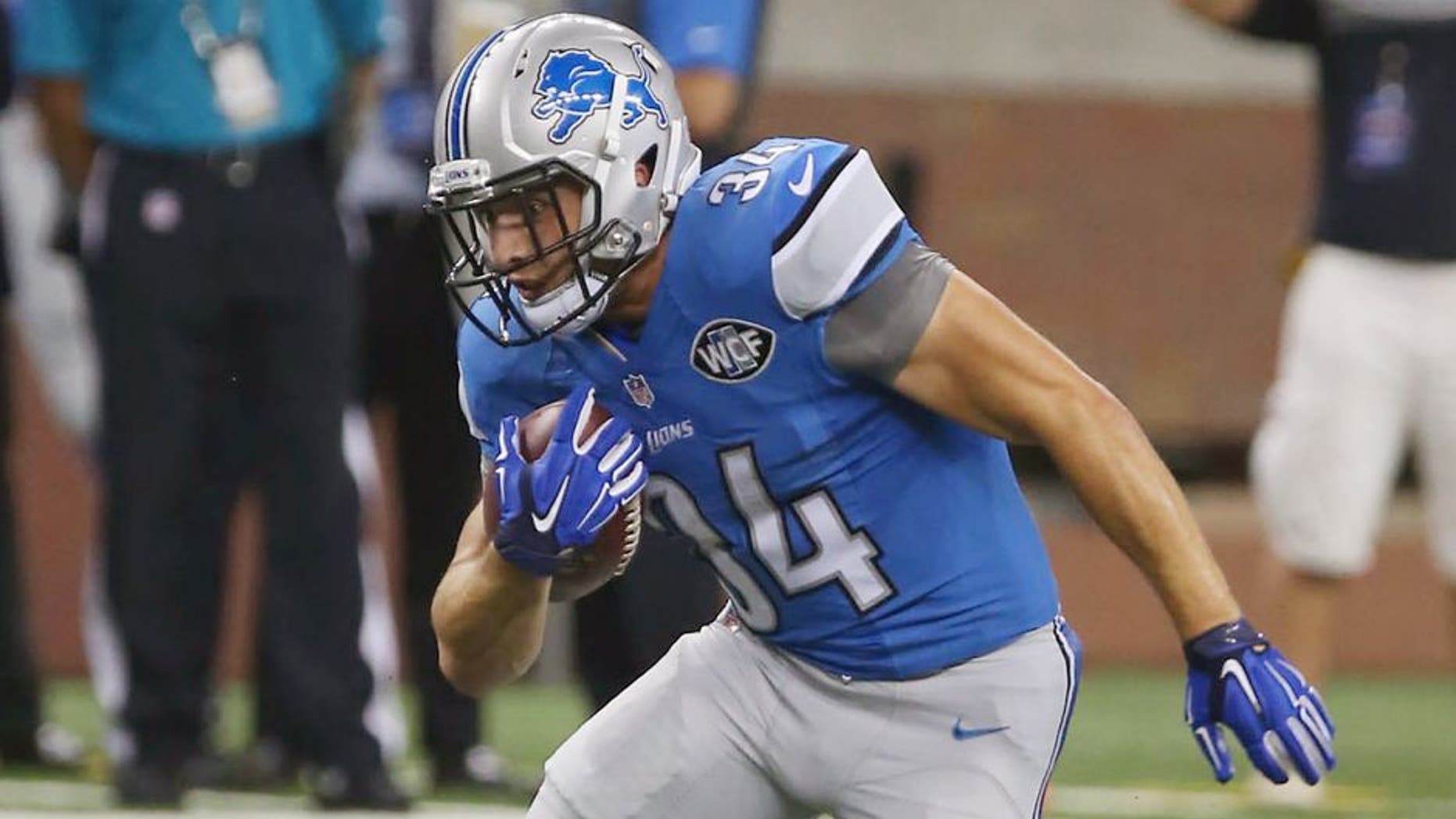 DETROIT, MI - AUGUST 13: Running Back Zach Zenner #34 of the Detroit Lions has a long gain against the New York Jets at Ford Field on August 13, 2015 in Detroit, Michigan. (Photo by Al Pereira/Getty Images for New York Jets)