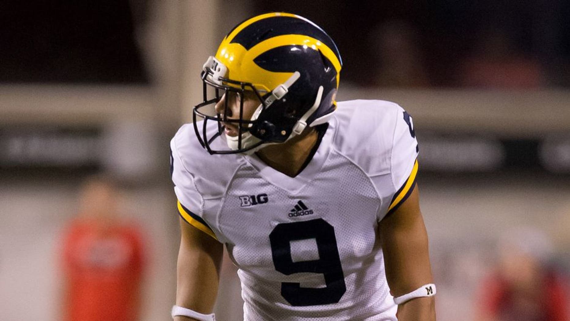 Sep 3, 2015; Salt Lake City, UT, USA; Michigan Wolverines wide receiver Grant Perry (9) lines up for a play during the second half against the Utah Utes at Rice-Eccles Stadium. Utah won 24-17. Mandatory Credit: Russ Isabella-USA TODAY Sports