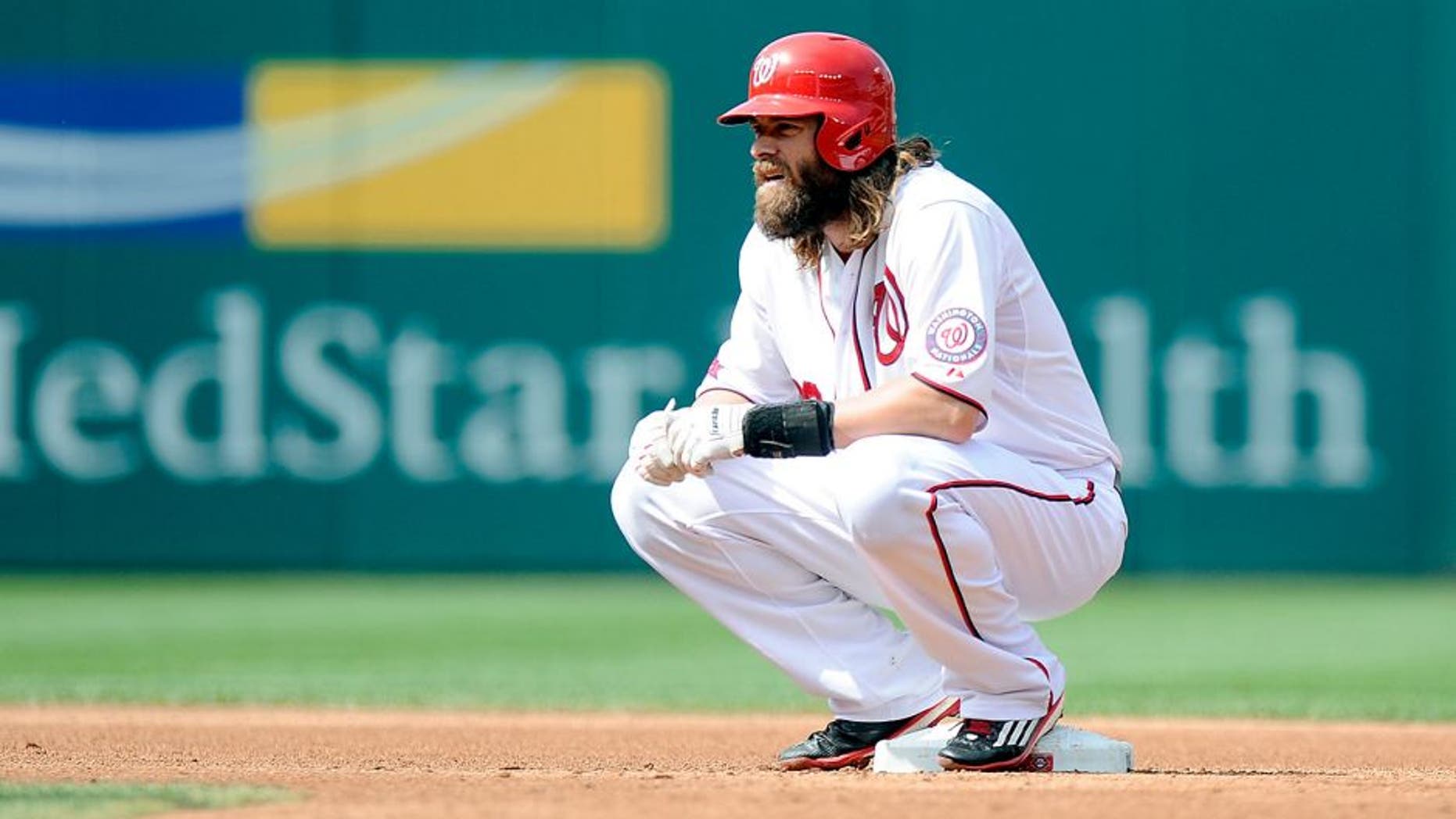 WASHINGTON, DC - AUGUST 30: Jayson Werth #28 of the Washington Nationals rests during a pitching change in the game against the Miami Marlins at Nationals Park on August 30, 2015 in Washington, DC. (Photo by G Fiume/Getty Images)