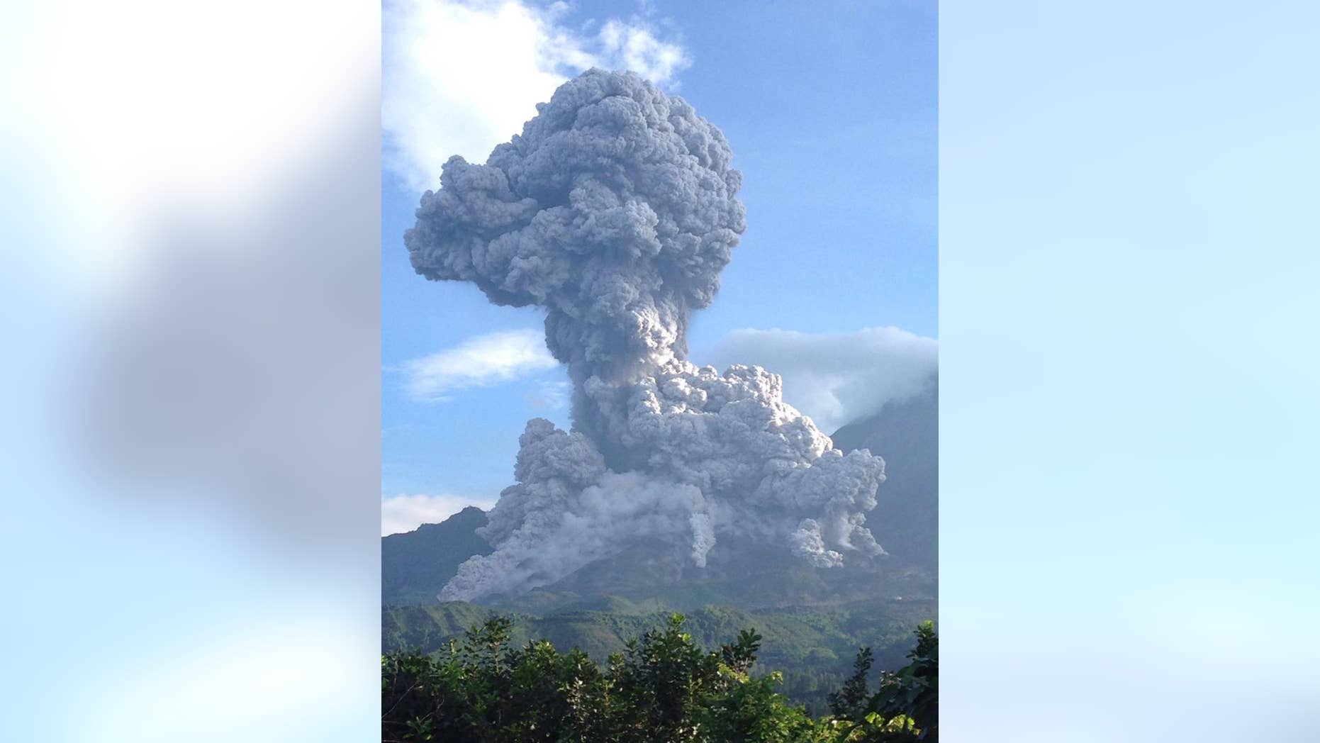 In this photo released by Guatemala's National Seismological Institute, the Santiaguito volcano blows outs a thick cloud of ash in Quetzaltenango, Guatemala, Tuesday, Aug. 16, 2016. Disaster response agency spokesman David De Leon said the ash fell as far away as Mexico's southern state of Chiapas. De Leon said the volcano is one of the most explosive in Latin America, with about 76 eruptions this year. (Guatemala's National Seismological Institute via AP)