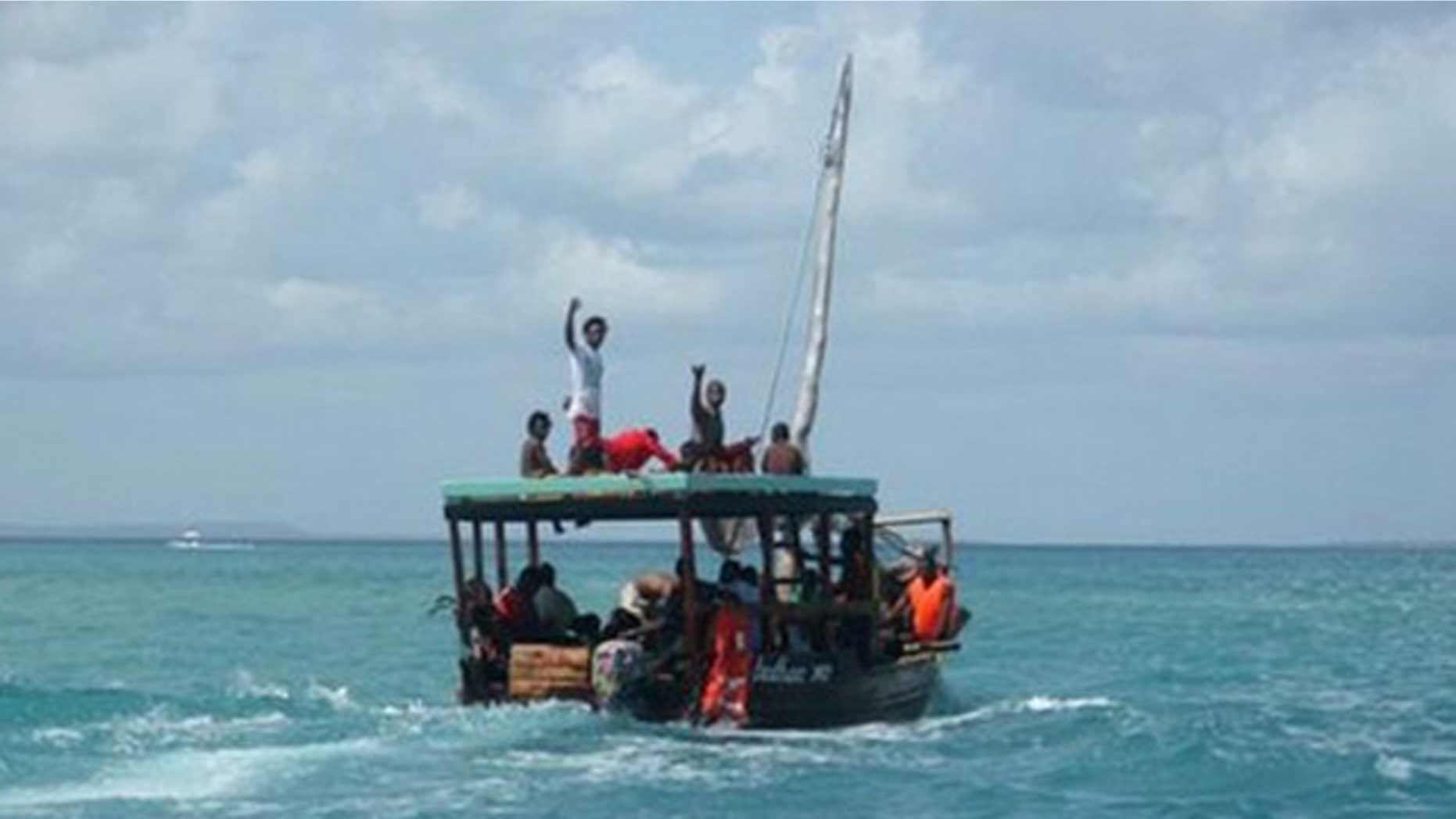 Sept. 10: A Zanzibar fishing vessel carries the survivors of the ferry crash ashore.
