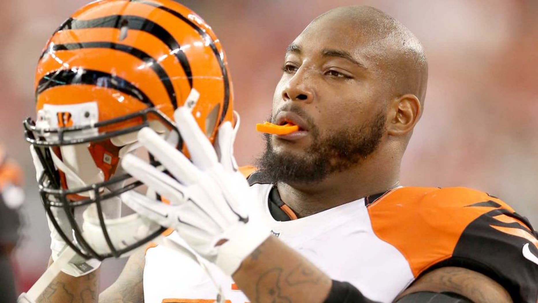 GLENDALE, AZ - AUGUST 24: Defensive tackle Devon Still #75 of the Cincinnati Bengals on the sidelines during the preseason NFL game against the Arizona Cardinals at the University of Phoenix Stadium on August 24, 2014 in Glendale, Arizona. The Bengals defeated the Cardinals 19-13. (Photo by Christian Petersen/Getty Images) *** Local Caption *** Devon Still