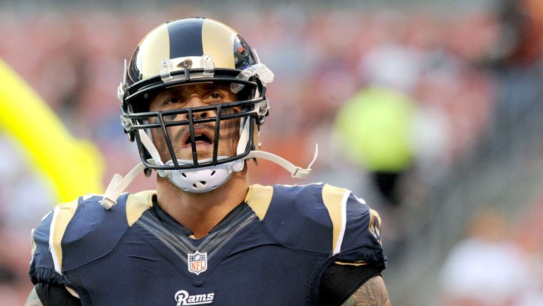CLEVELAND, OH - AUGUST 23, 2014: Defensive end Chris Long #91 of the St. Louis Rams walks onto the field piror to a preseason game against the Cleveland Browns on August 23, 2014 at FirstEnergy Stadium in Cleveland, Ohio. St. Louis won 33-14. (Photo by Nick Cammett/Diamond Images/Getty Images) *** Local Caption *** Chris Long