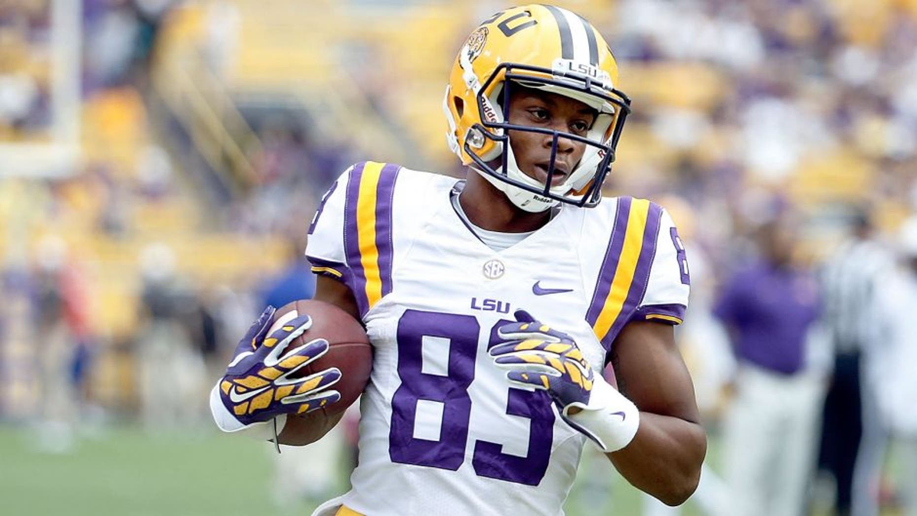 BATON ROUGE, LA - SEPTEMBER 06: Travin Dural #83 of the LSU Tigers participates in warmups prior to a game against the Sam Houston State Bearkats at Tiger Stadium on September 6, 2014 in Baton Rouge, Louisiana. LSU won the game 56-0. (Photo by Stacy Revere/Getty Images) *** Local Caption *** Travin Dural