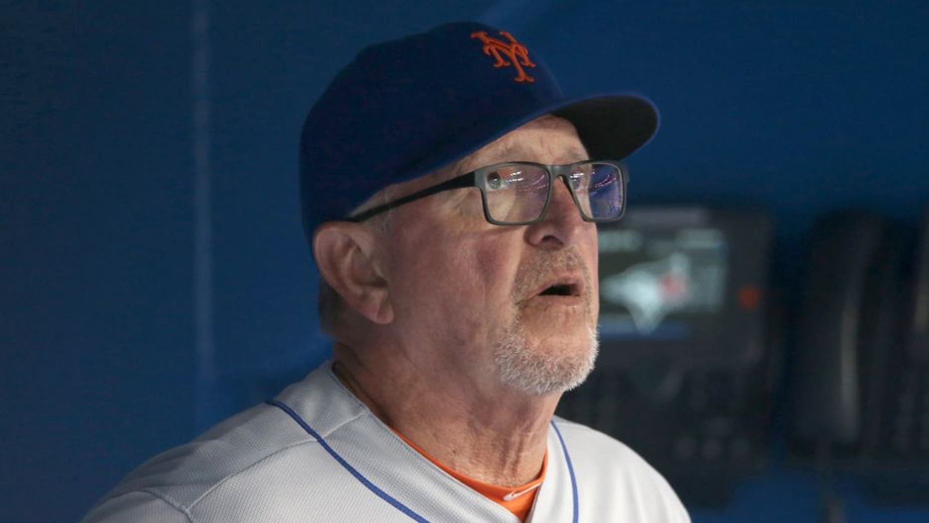TORONTO, CANADA - JUNE 17: Pitching coach Dan Warthen #59 of the New York Mets looks on from the dugout during an MLB game against the Toronto Blue Jays on June 17, 2015 at Rogers Centre in Toronto, Ontario, Canada. (Photo by Tom Szczerbowski/Getty Images)