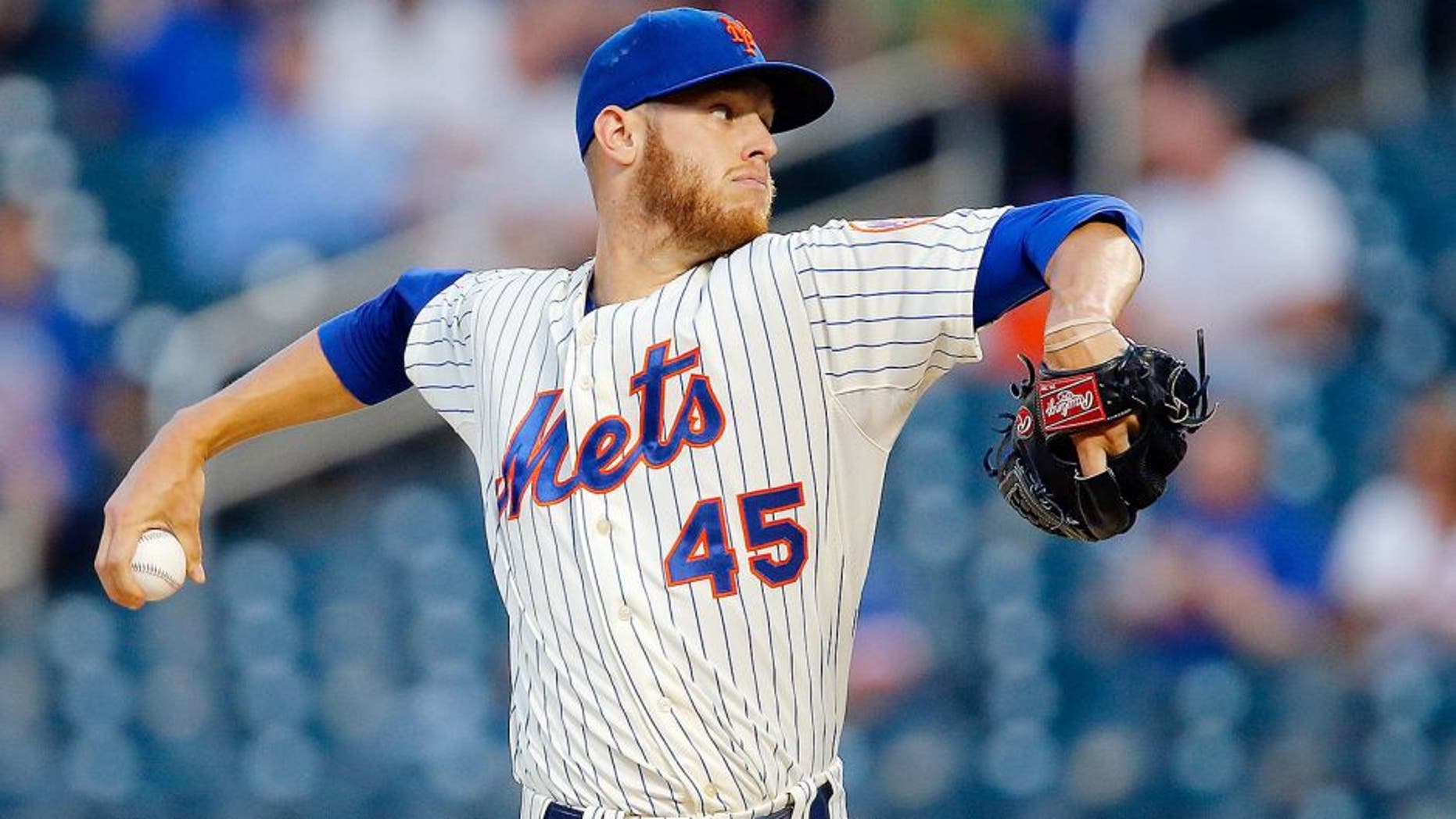 NEW YORK, NY - AUGUST 27: Zack Wheeler #45 of the New York Mets in action against the Atlanta Braves at Citi Field on August 27, 2014 in the Flushing neighborhood of the Queens borough of New York City. The Braves defeated the Mets 3-2. (Photo by Jim McIsaac/Getty Images) *** Local Caption *** Zack Wheeler