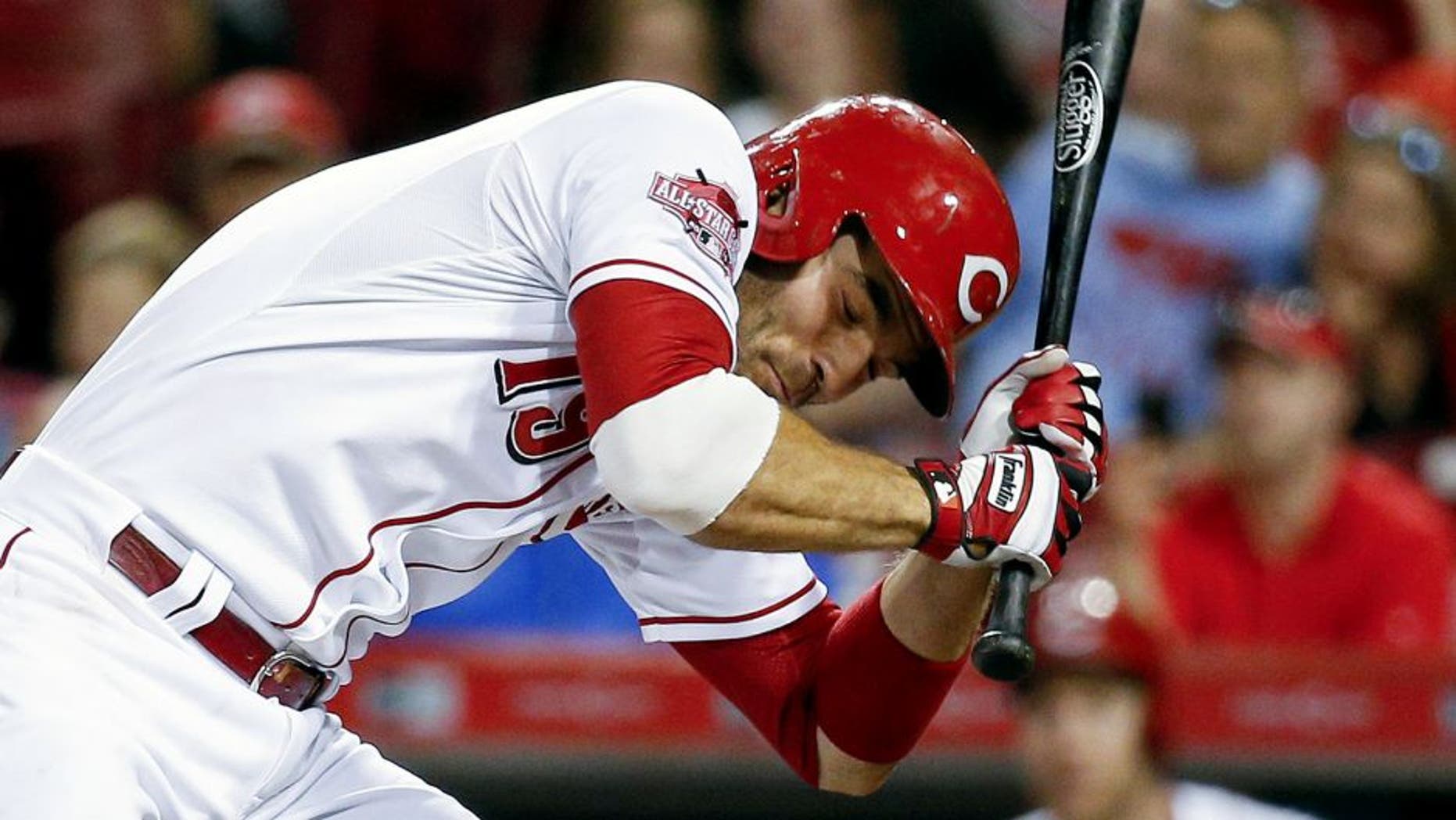 Cincinnati Reds' Joey Votto dodges a pitch from St. Louis Cardinals starter Jaime Garcia in the fifth inning of a baseball game, Thursday, Sept. 10, 2015, in Cincinnati. (AP Photo/John Minchillo)