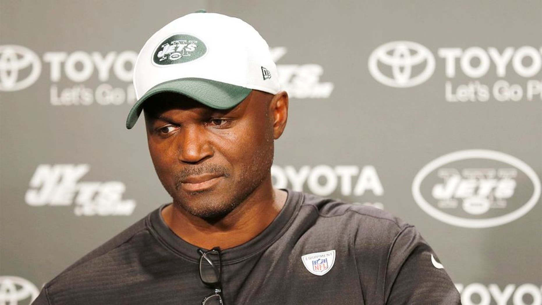 August 11, 2015; Florham Park, NJ, USA; New York Jets head coach Todd Bowles answers questions about Geno Smith (not pictured) after the New York Jets hold practice at the Atlantic Health Jets Training Center. Mandatory Credit: John Munson/THE STAR-LEDGER via USA TODAY Sports