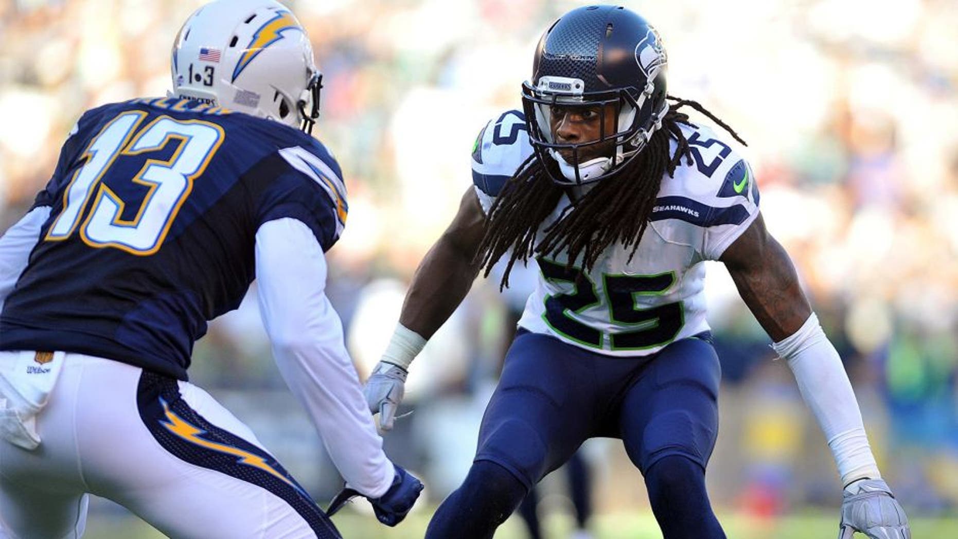 Aug 29, 2015; San Diego, CA, USA; Seattle Seahawks cornerback Richard Sherman (25) covers San Diego Chargers wide receiver Keenan Allen (13) at Qualcomm Stadium. Mandatory Credit: Orlando Ramirez-USA TODAY Sports