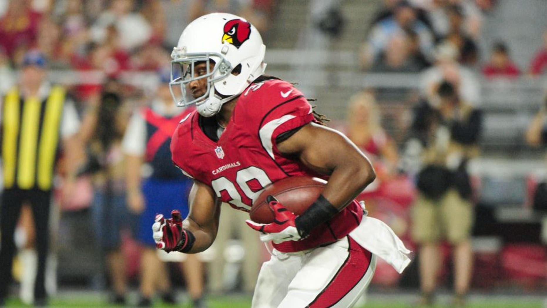 Aug 22, 2015; Glendale, AZ, USA; Arizona Cardinals running back Andre Ellington (38) carries the ball during the first half against the San Diego Chargers at University of Phoenix Stadium. Mandatory Credit: Matt Kartozian-USA TODAY Sports
