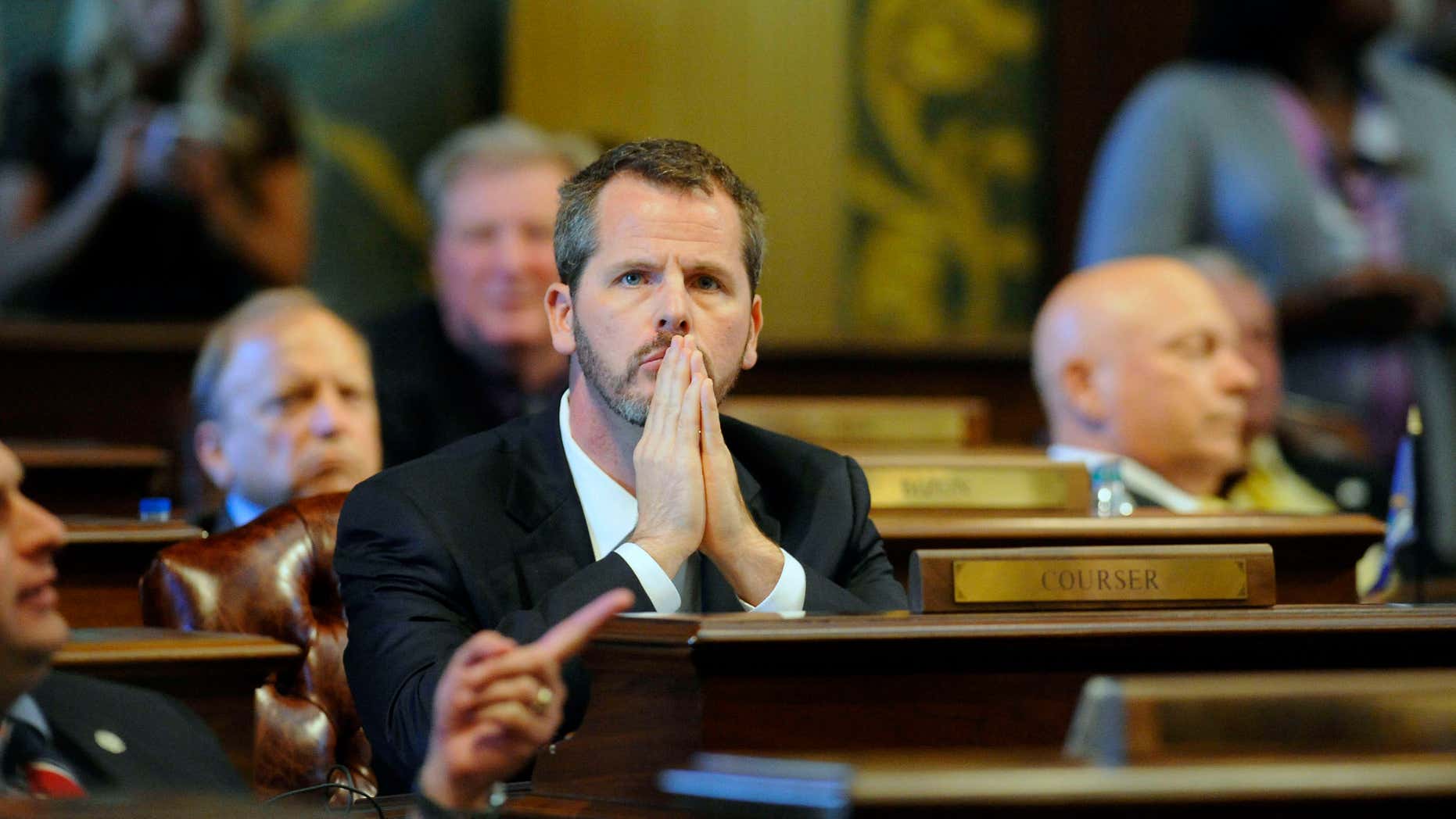 SEpt. 10, 2015: State Rep. Todd Courser watches the vote board as votes roll in in Lansing, Mich.