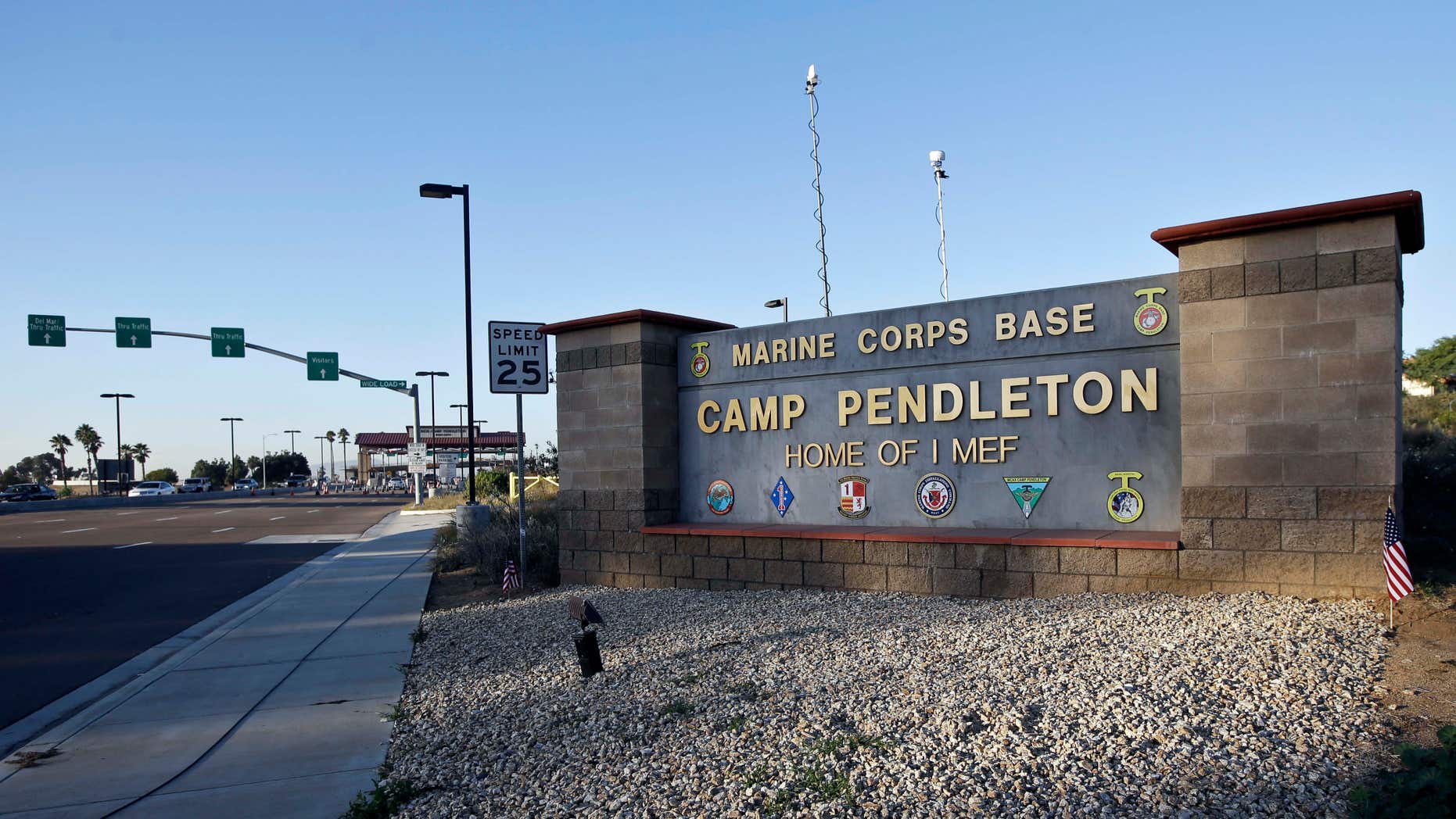 FILE - This Nov. 13, 2013 file photo shows the main gate of Camp Pendleton Marine Base at Camp Pendleton, Calif.