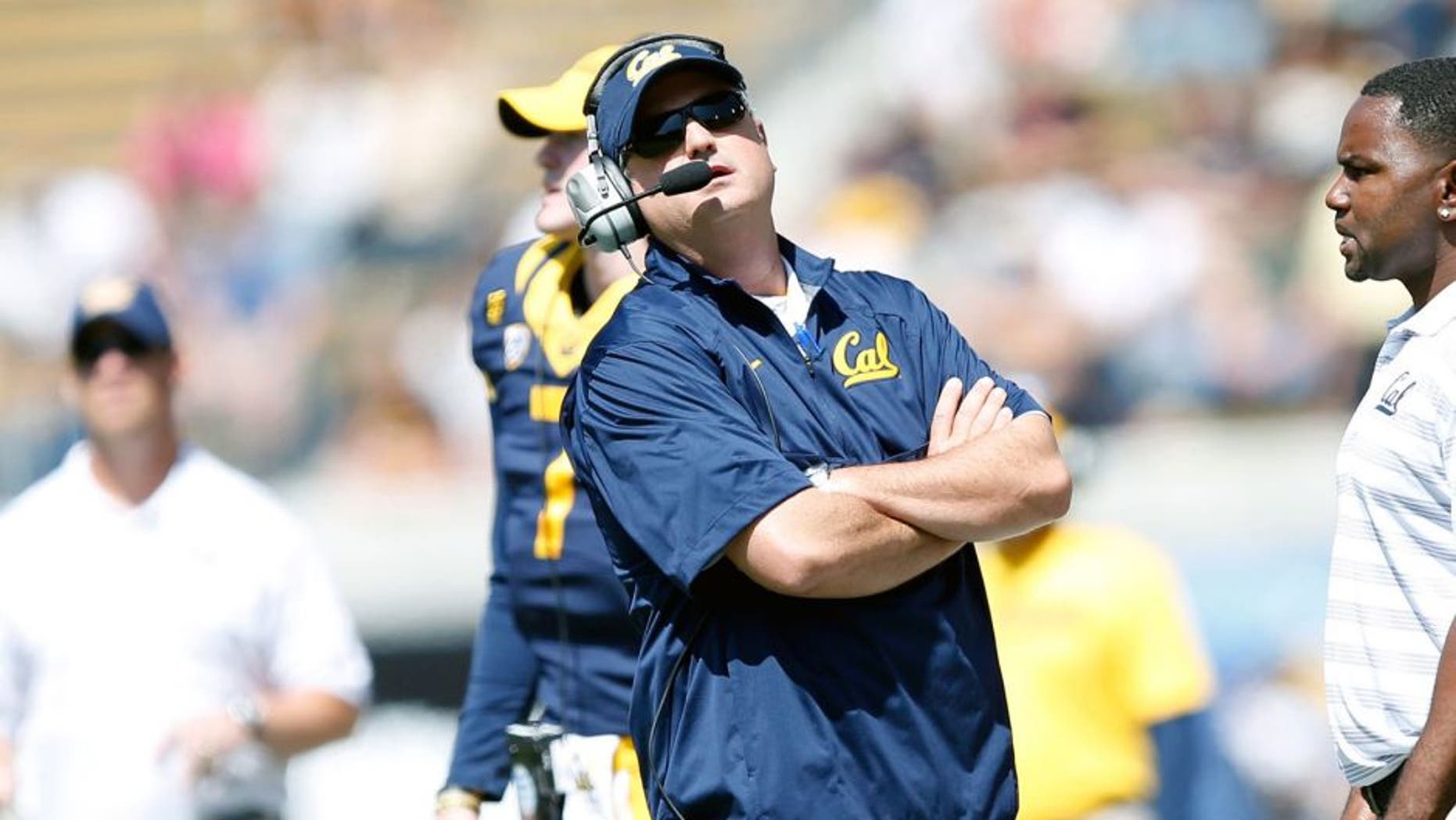 Sep 6, 2014; Berkeley, CA, USA; California Golden Bears head coach Sonny Dykes looks at the scoreboard from the sidelines during the first quarter in a game against the Sacramento State Hornets at Memorial Stadium. Mandatory Credit: Bob Stanton-USA TODAY Sports