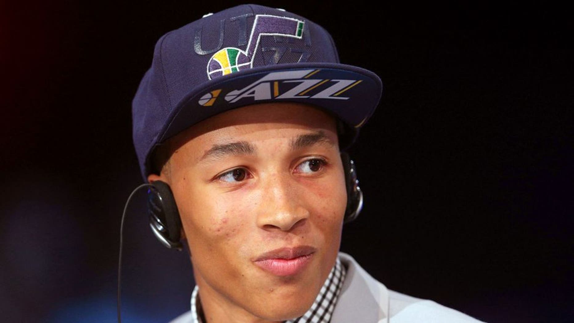 Jun 26, 2014; Brooklyn, NY, USA; Dante Exum (Australia) is interviewed after being selected as the number five overall pick to the Utah Jazz in the 2014 NBA Draft at the Barclays Center. Mandatory Credit: Brad Penner-USA TODAY Sports