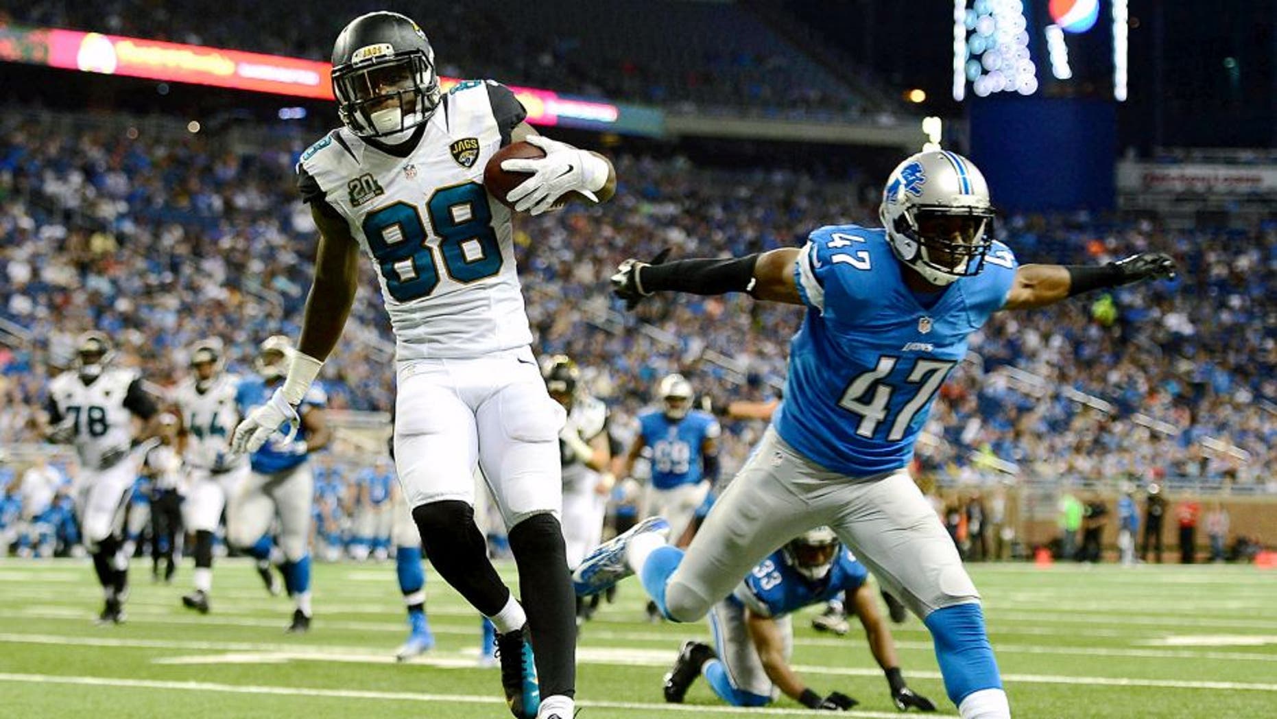 Aug 22, 2014; Detroit, MI, USA; Jacksonville Jaguars wide receiver Allen Hurns (88) gets away from Detroit Lions defensive back Nate Ness (47) to score a touchdown during the third quarter at Ford Field. Mandatory Credit: Andrew Weber-USA TODAY Sports