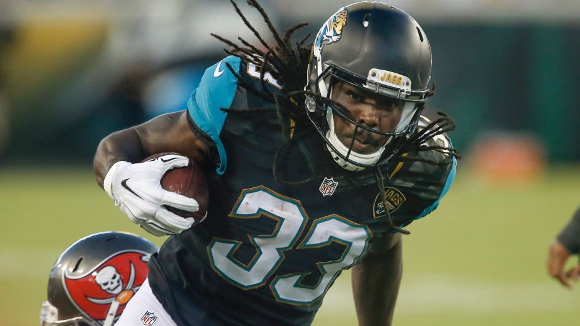 Aug 20, 2016; Jacksonville, FL, USA; Jacksonville Jaguars running back Chris Ivory (33) runs during the first quarter of a football game against the Tampa Bay Buccaneers at EverBank Field. Mandatory Credit: Reinhold Matay-USA TODAY Sports